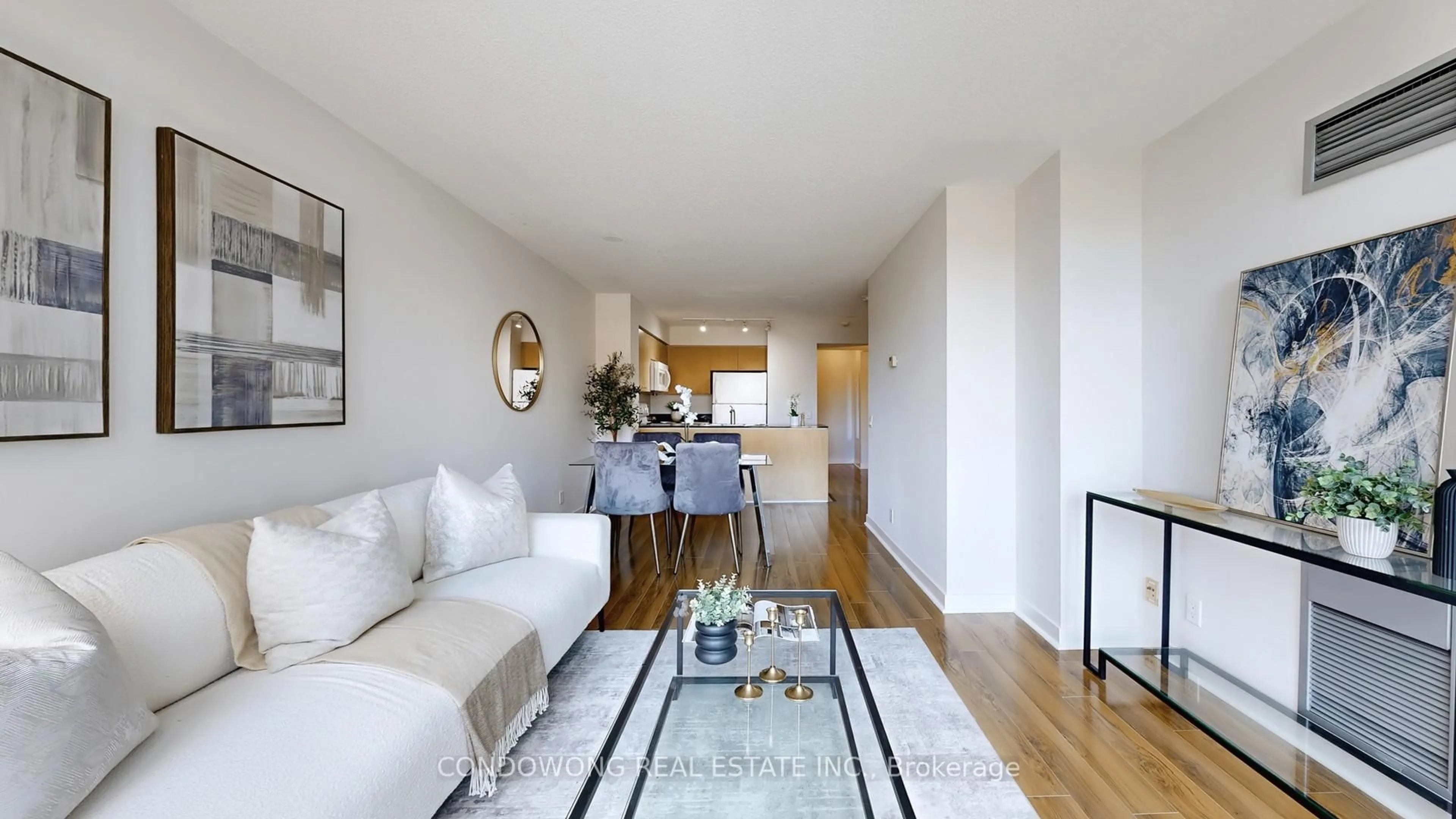 Living room with furniture, wood/laminate floor for 373 Front St #512, Toronto Ontario M5V 3R7