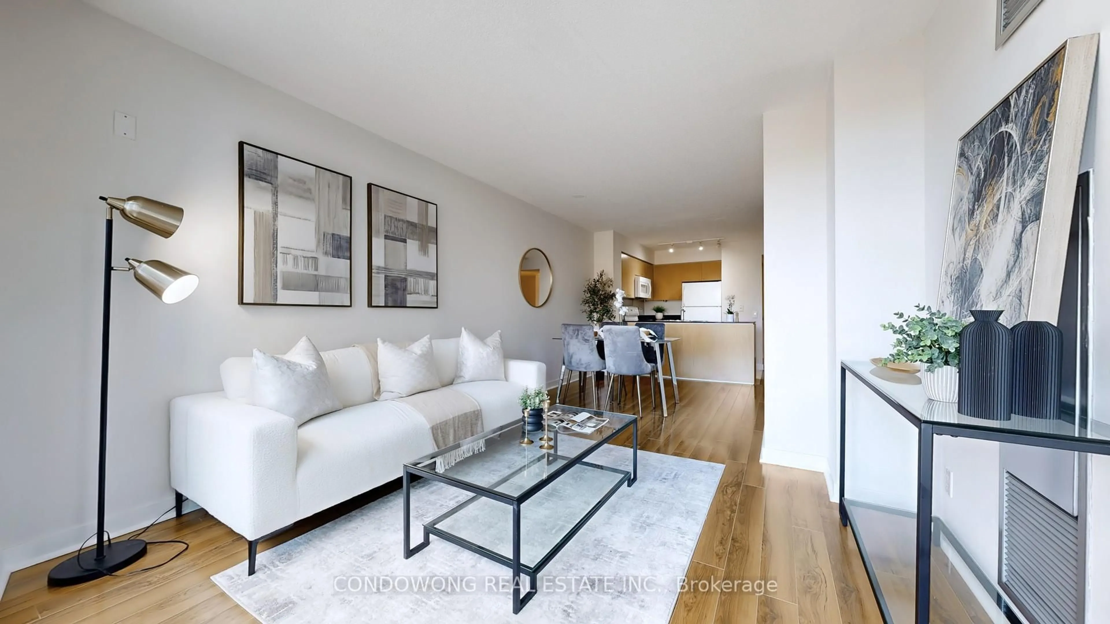 Living room with furniture, wood/laminate floor for 373 Front St #512, Toronto Ontario M5V 3R7
