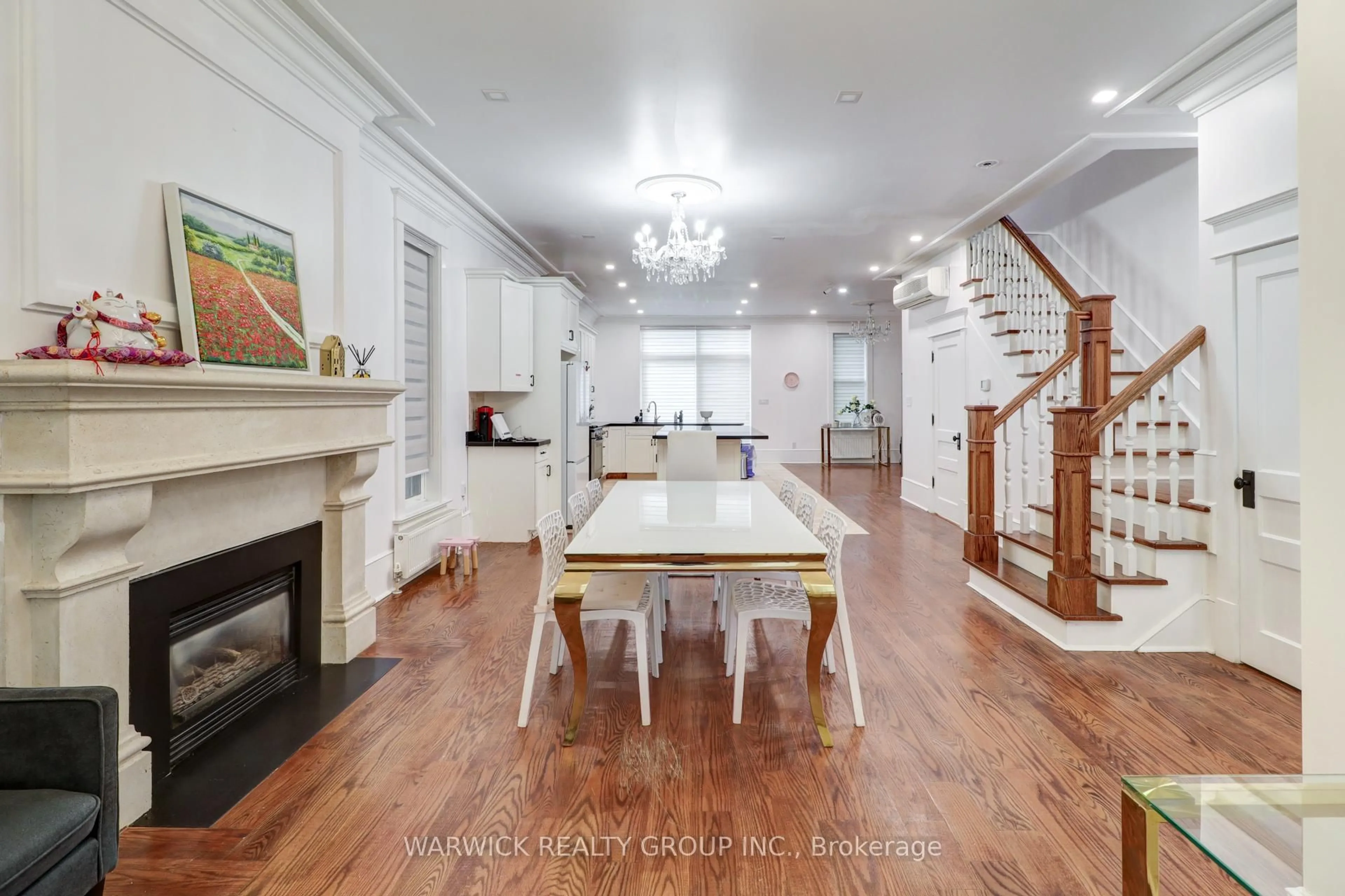 Dining room, wood/laminate floor for 61 Brunswick Ave, Toronto Ontario M5S 2L8