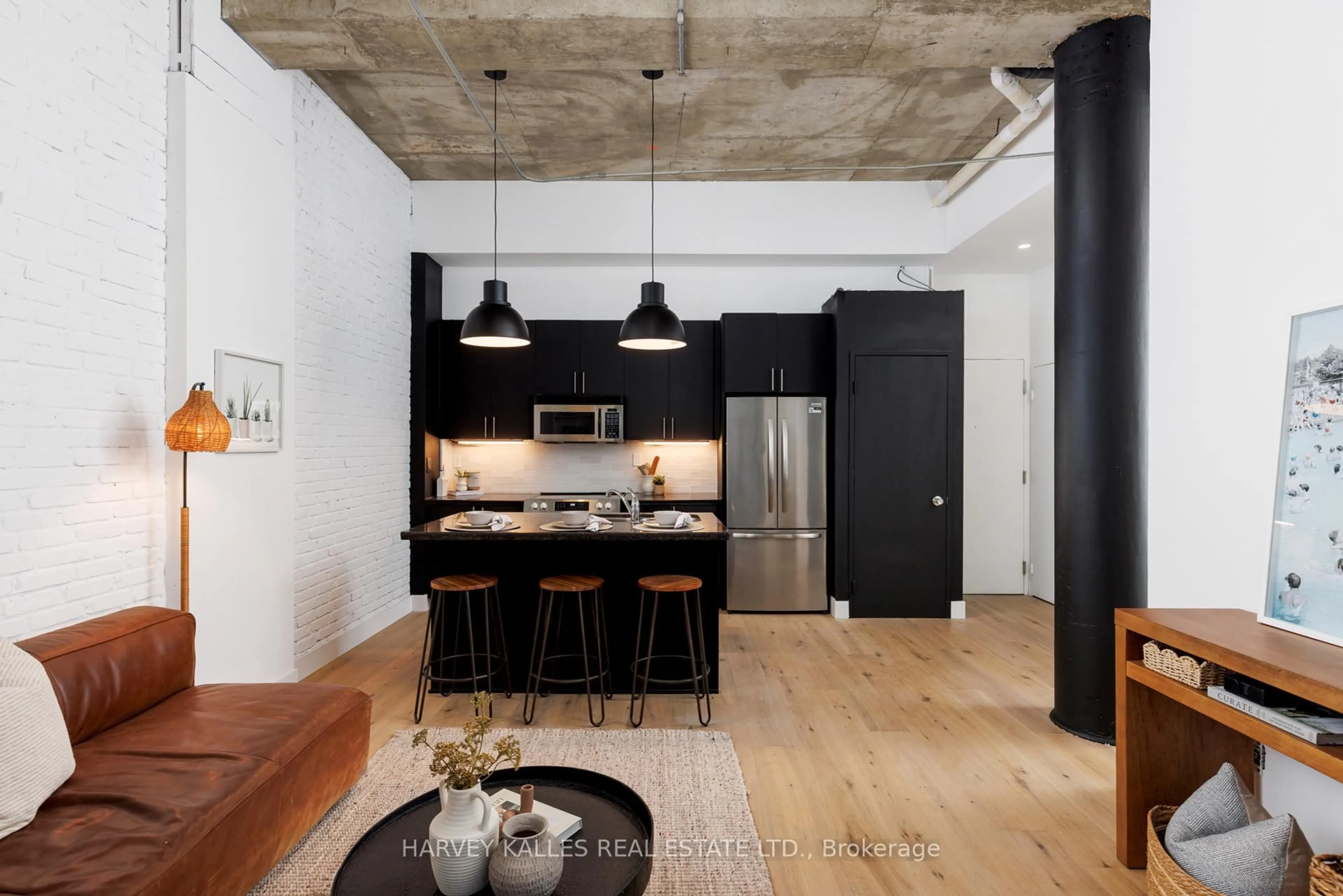 Open concept kitchen, cement floor for 901 Queen St #105, Toronto Ontario M6J 3X4