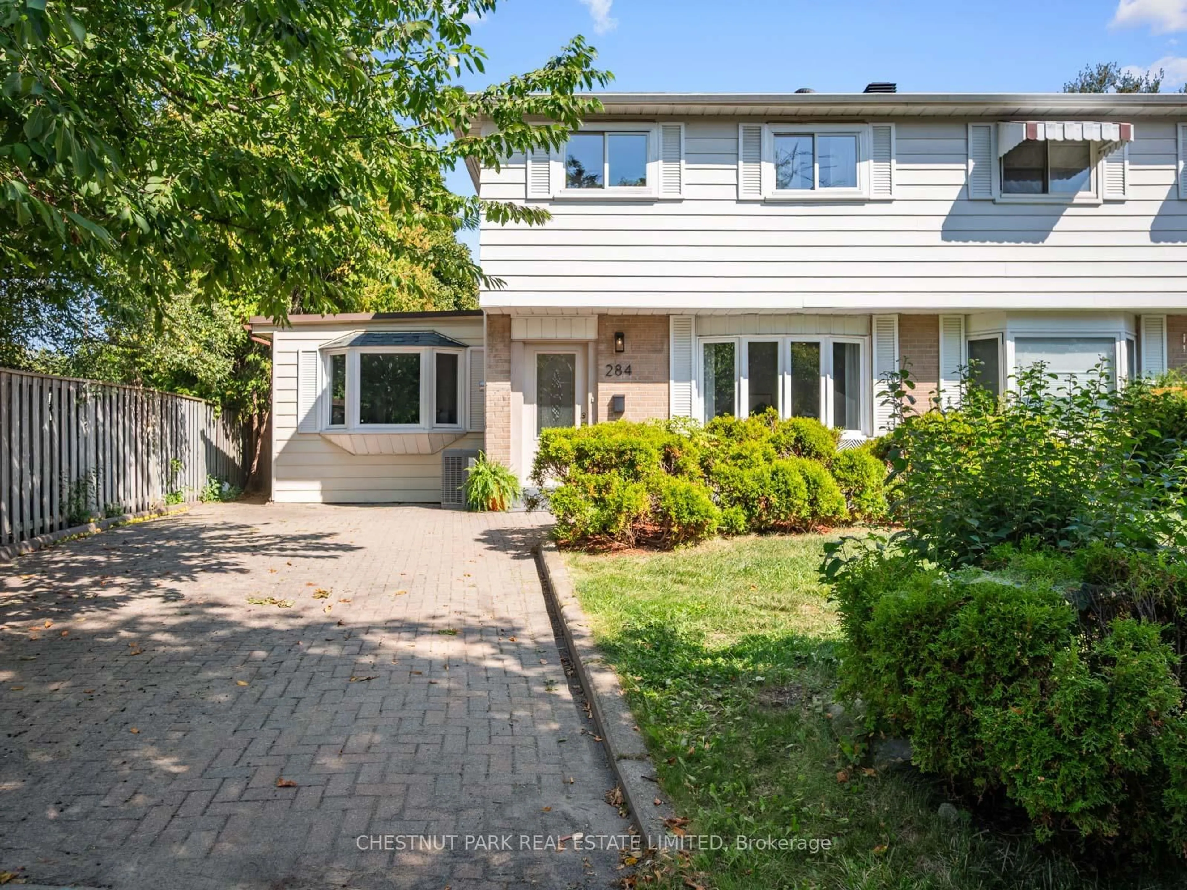 Home with brick exterior material, street for 284 Hollyberry Tr, Toronto Ontario M2H 2P4