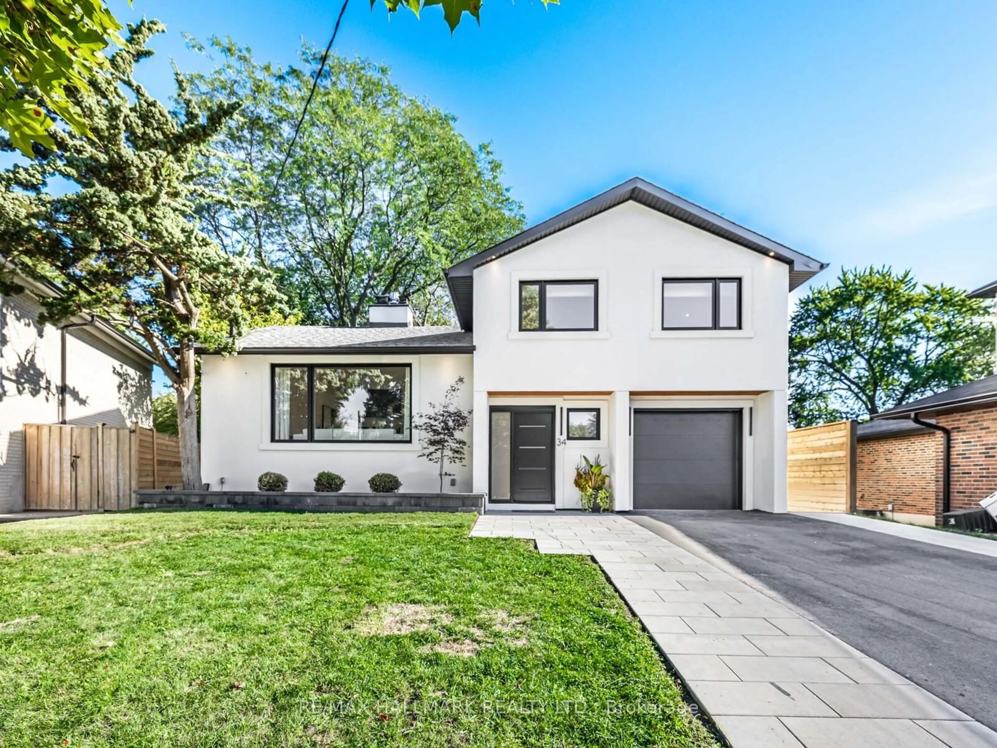 Home with brick exterior material, street for 34 Lantana Crt, Toronto Ontario M4A 2H8