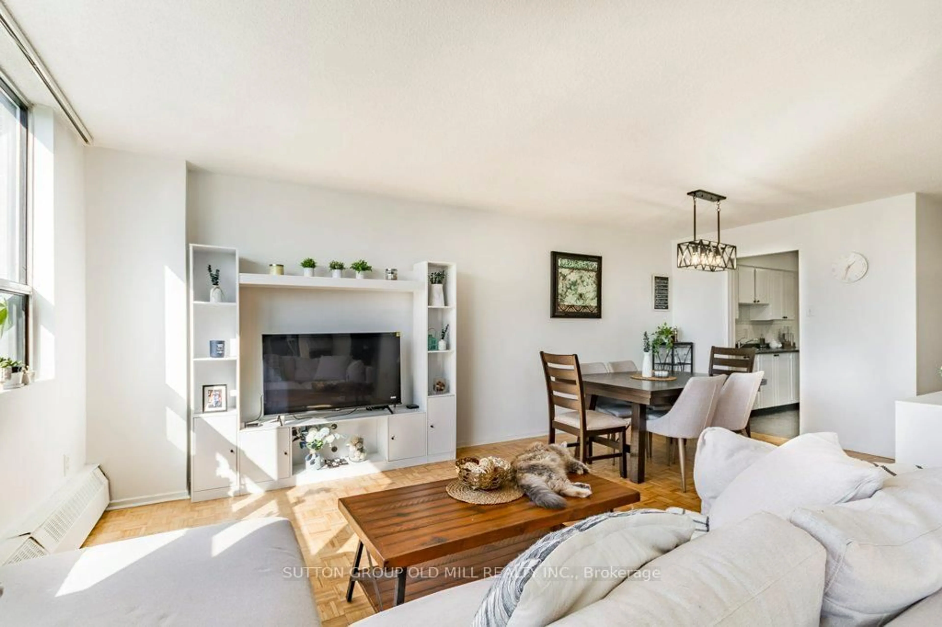 Living room with furniture, wood/laminate floor for 25 Sunrise Ave #306, Toronto Ontario M4A 2S2