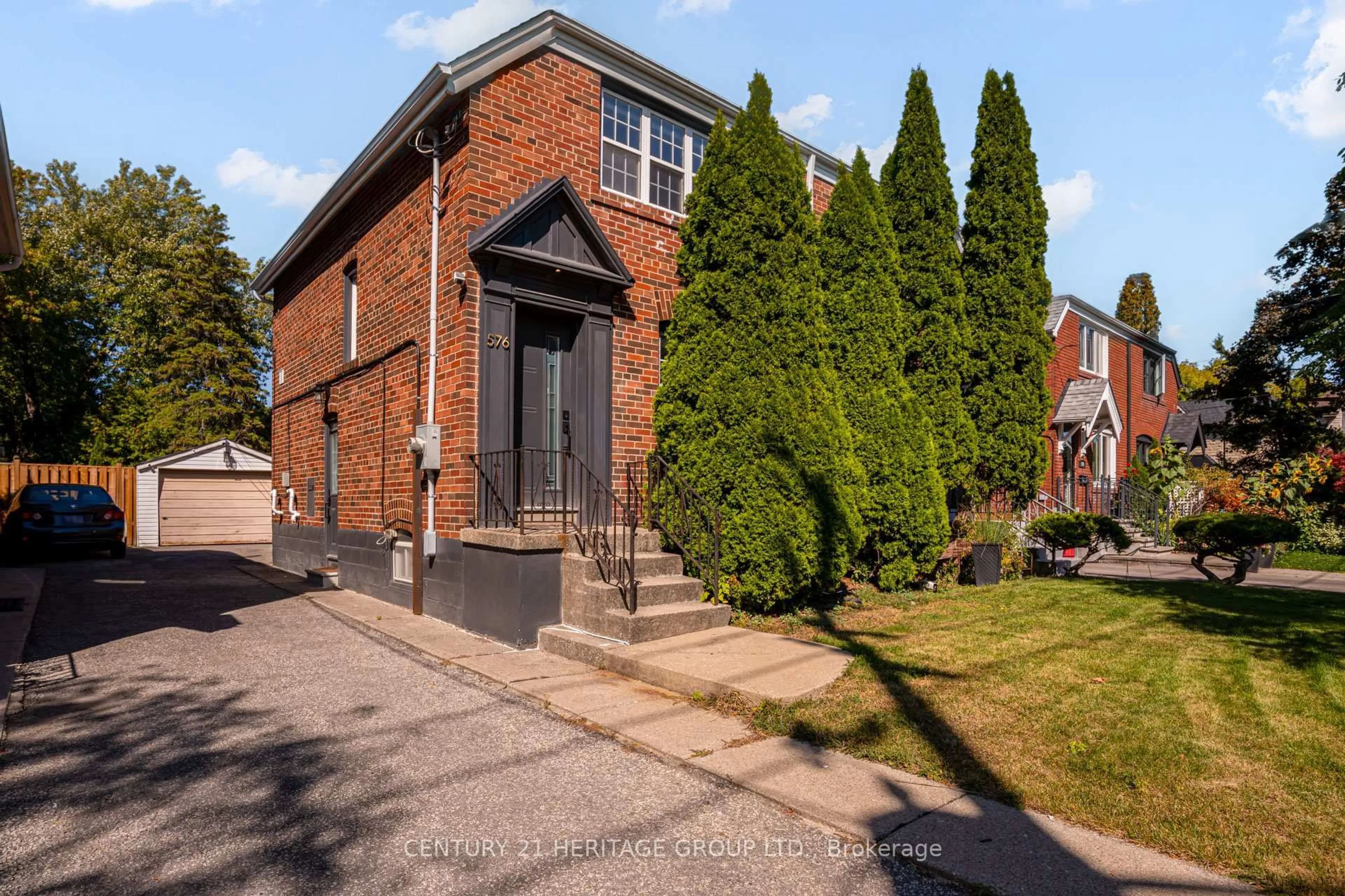 Home with brick exterior material, street for 576 Broadway Ave, Toronto Ontario M4G 2S3