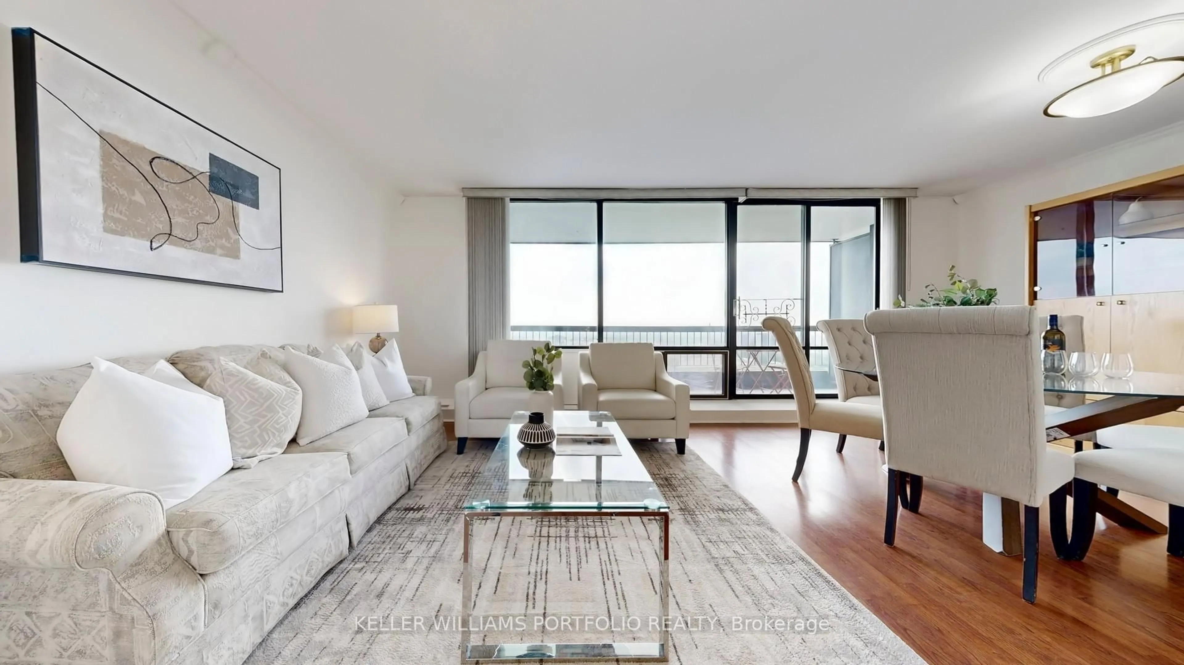Living room with furniture, wood/laminate floor for 135 Antibes Dr #2105, Toronto Ontario M2R 2Z1