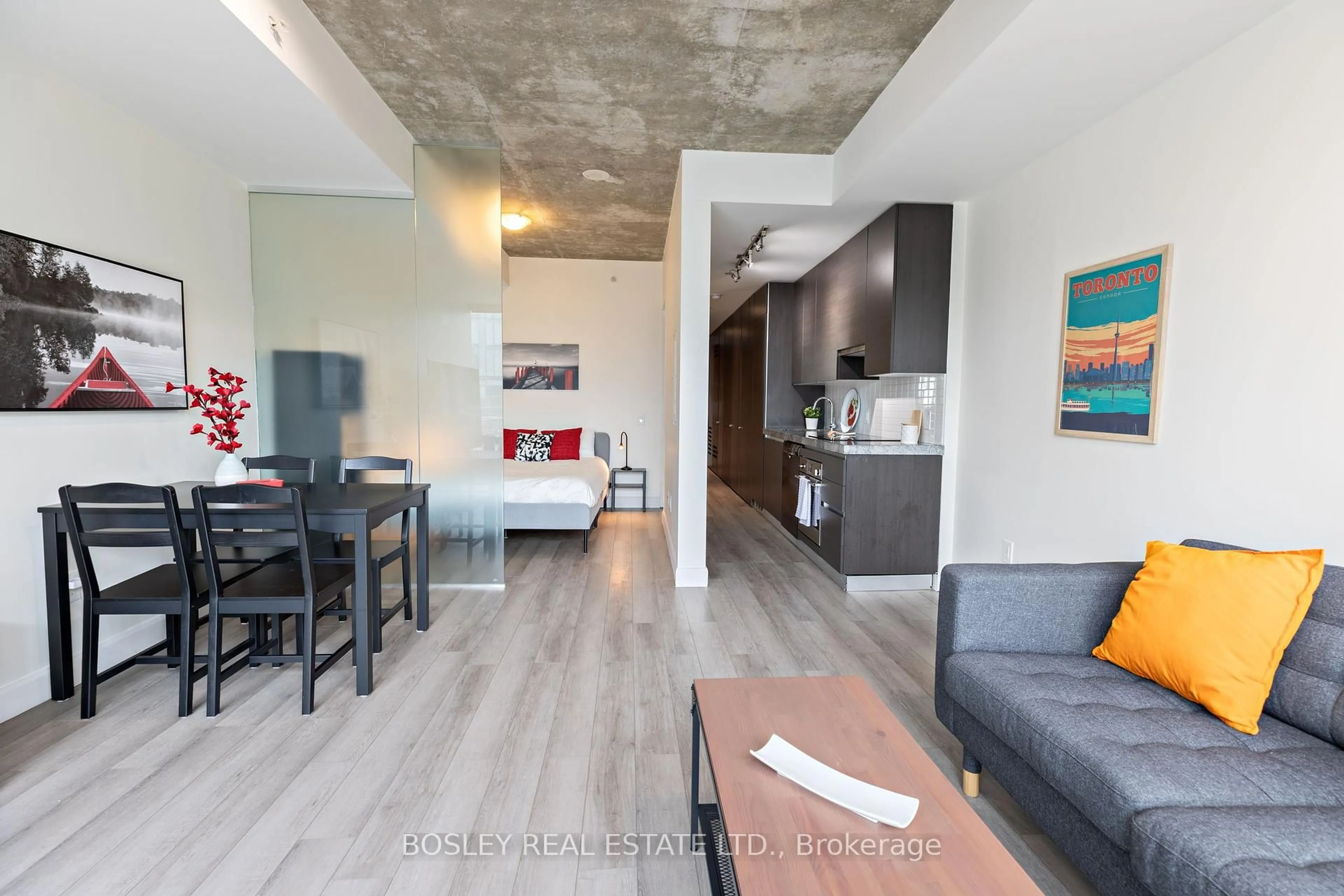 Living room with furniture, cement floor for 629 King St #816, Toronto Ontario M5V 1M5