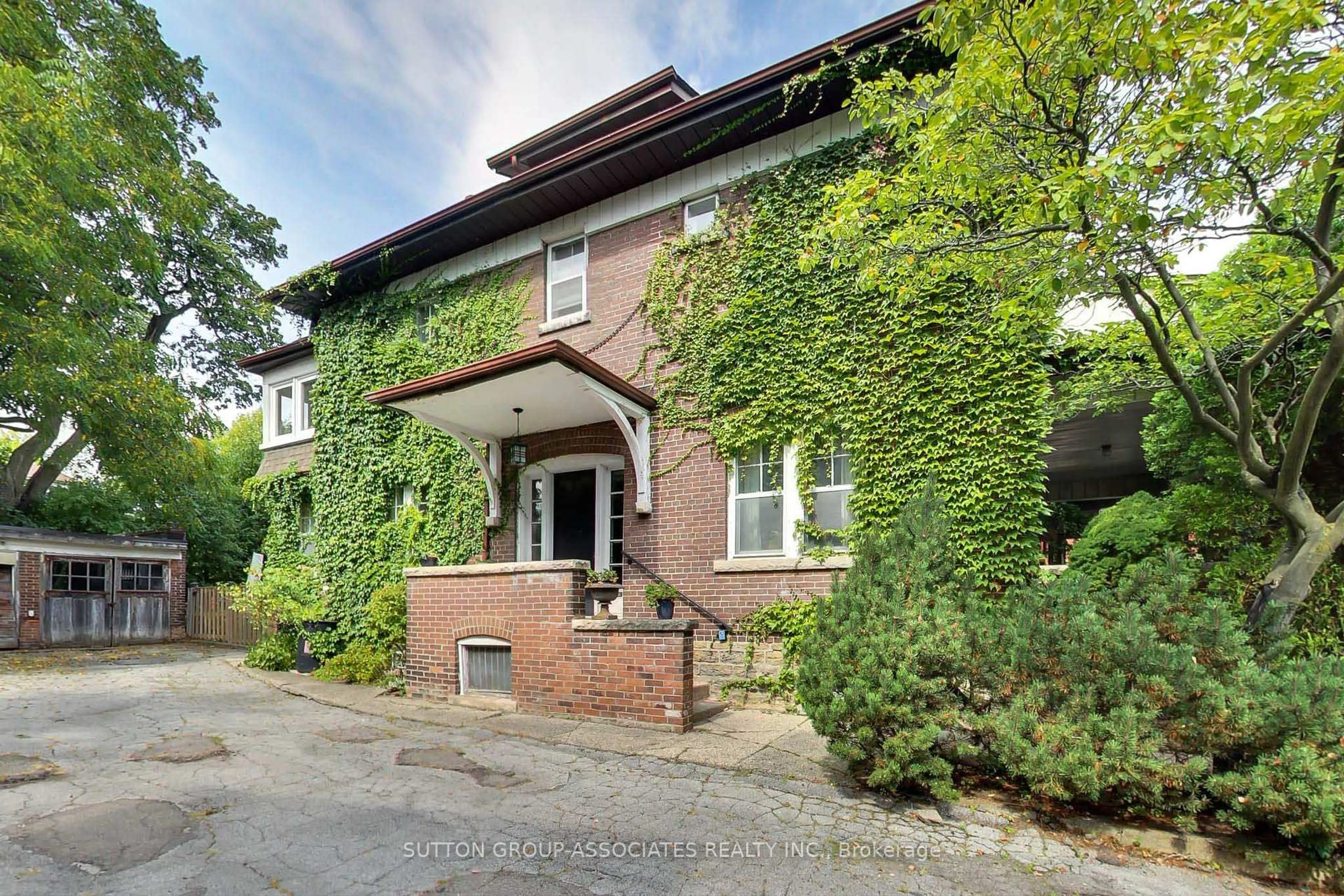 Home with brick exterior material, street for 14 Bracondale Hill Rd, Toronto Ontario M6G 3P4