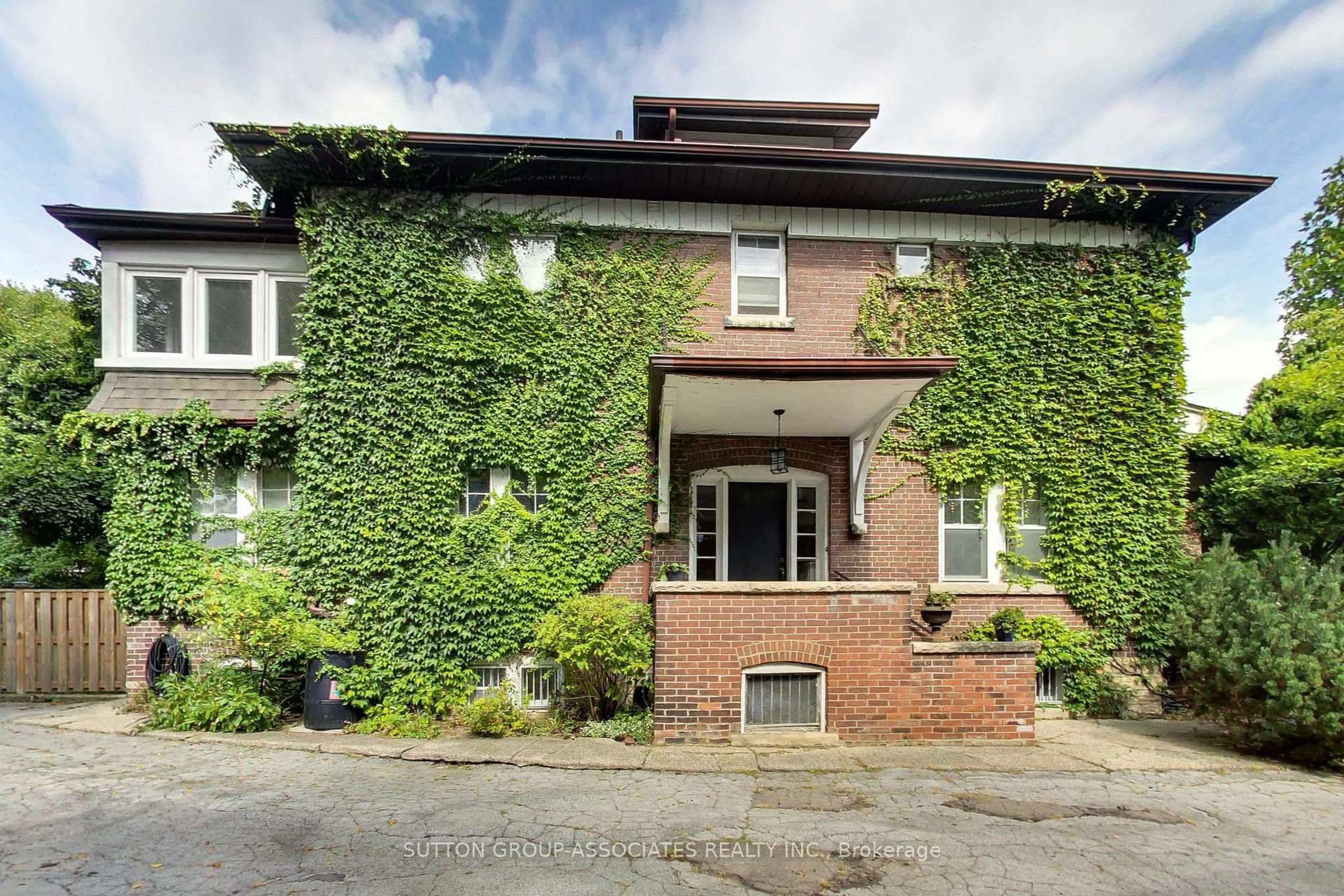 Home with brick exterior material, building for 14 Bracondale Hill Rd, Toronto Ontario M6G 3P4