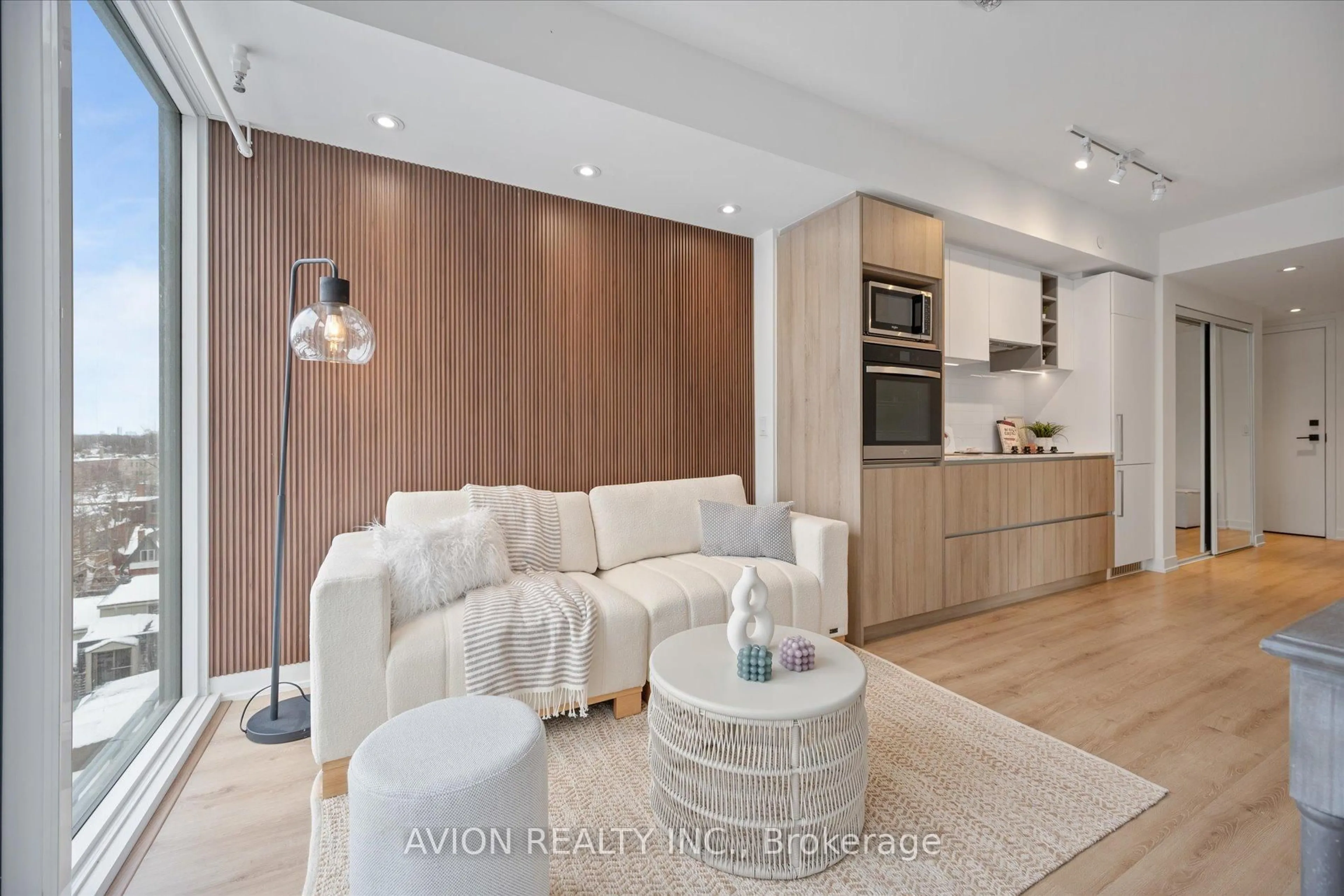 Living room with furniture, wood/laminate floor for 319 Jarvis St #606, Toronto Ontario M5B 0C8