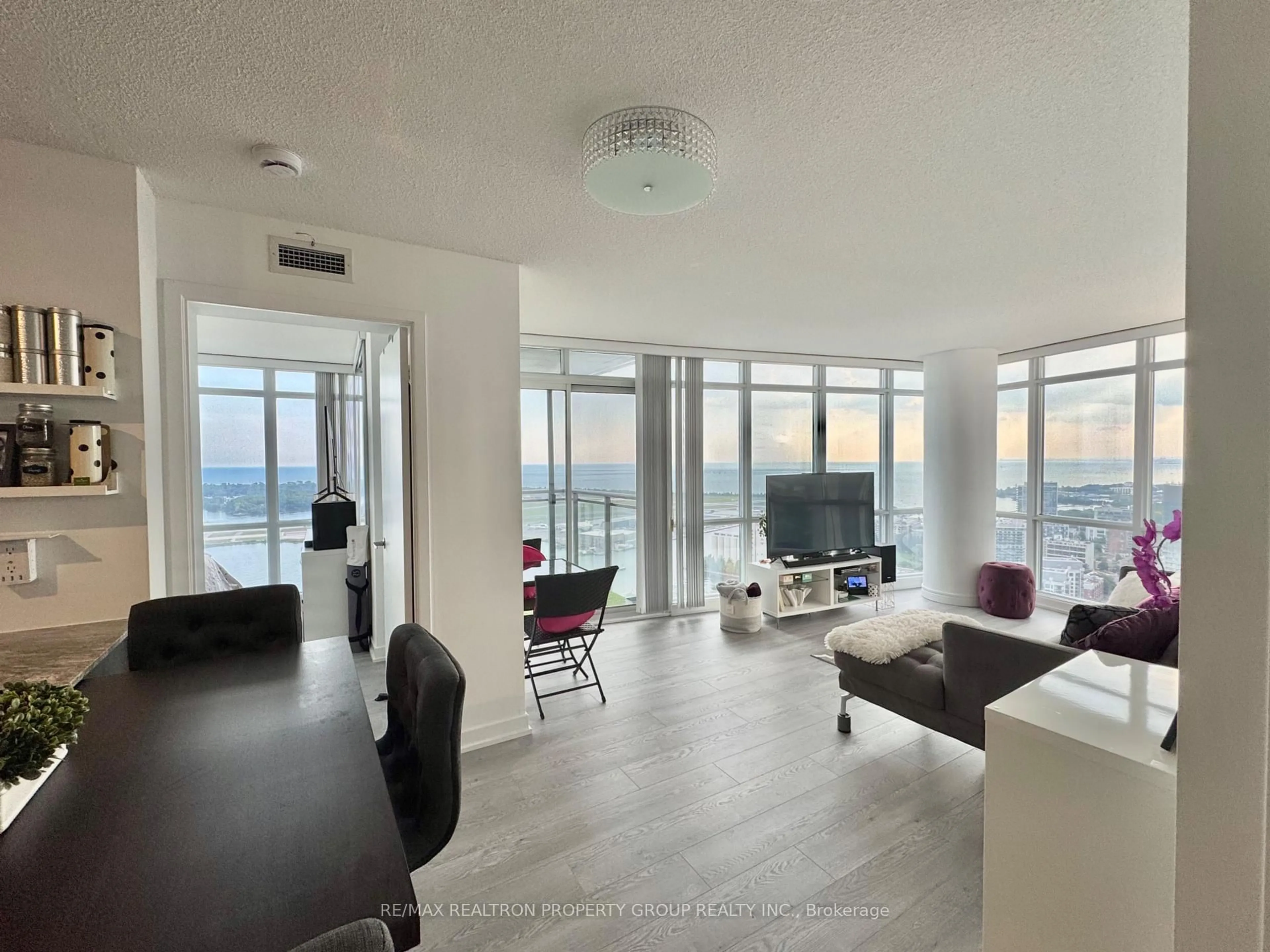 Living room with furniture, floor is not visible for 11 Brunel Crt #4515, Toronto Ontario M5V 3Y3