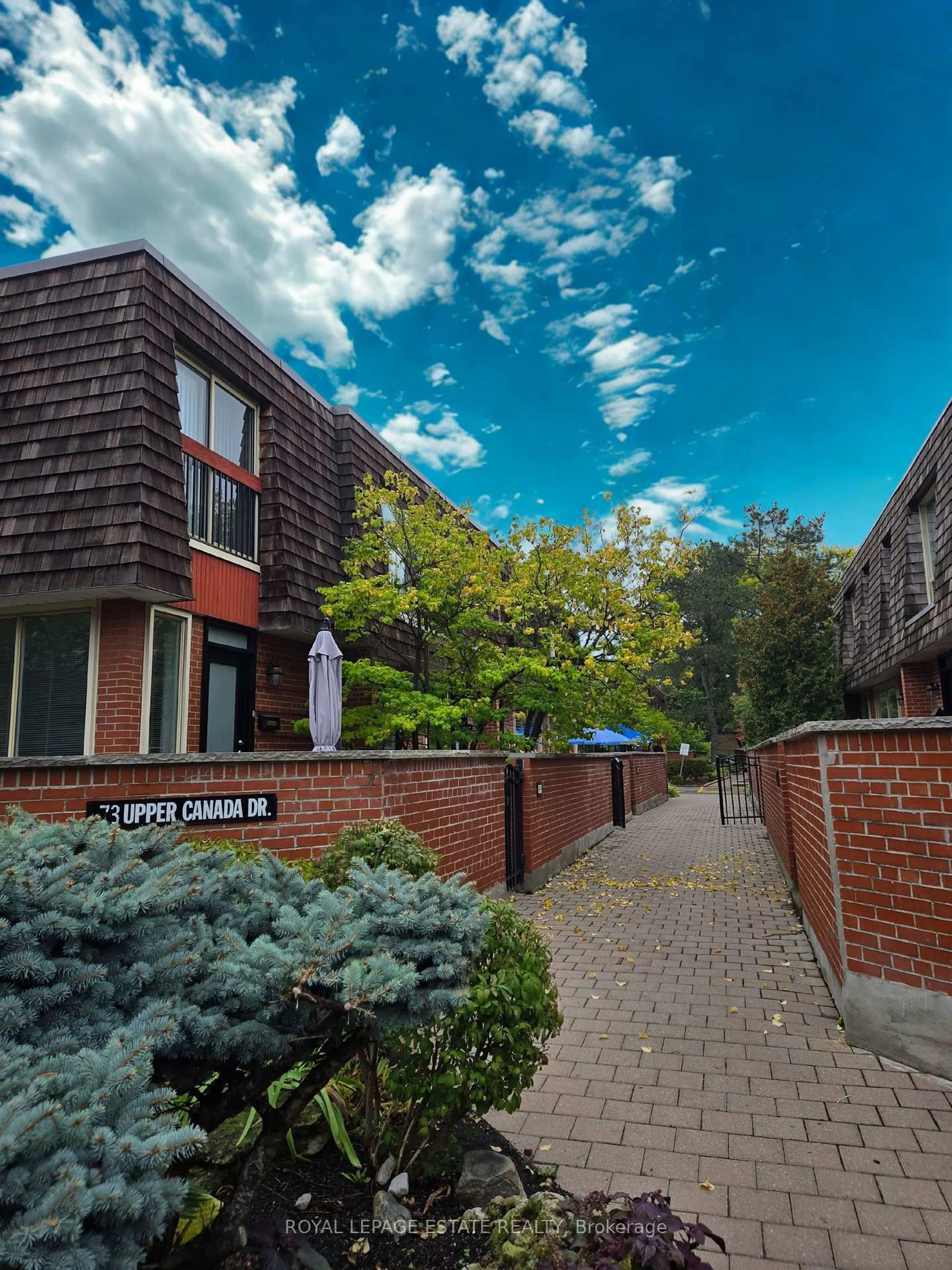 Home with brick exterior material, street for 73 Upper Canada Dr #Th1, Toronto Ontario M2P 2A2
