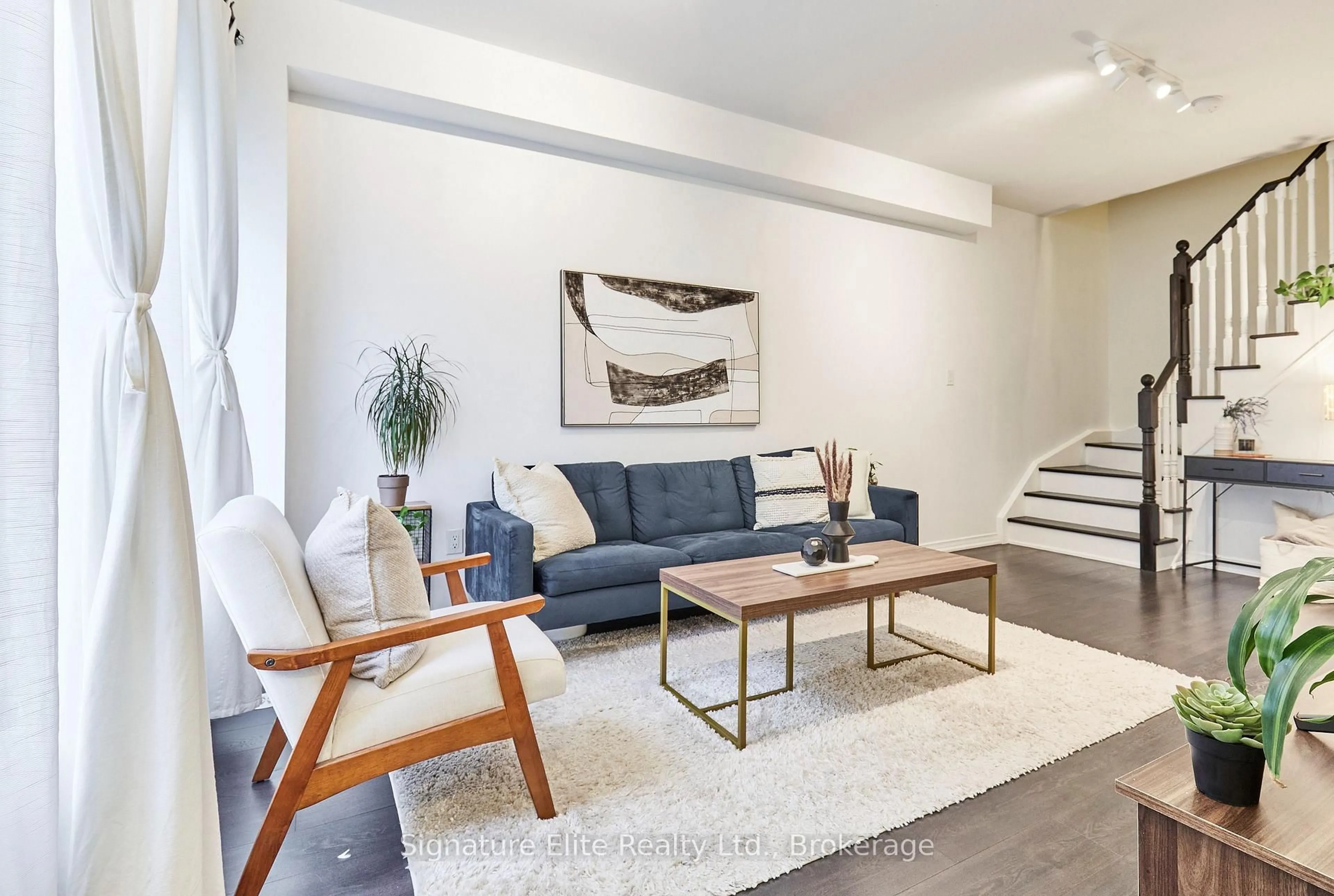 Living room with furniture, unknown for 31 Coneflower Cres #37, Toronto Ontario M2R 0A5