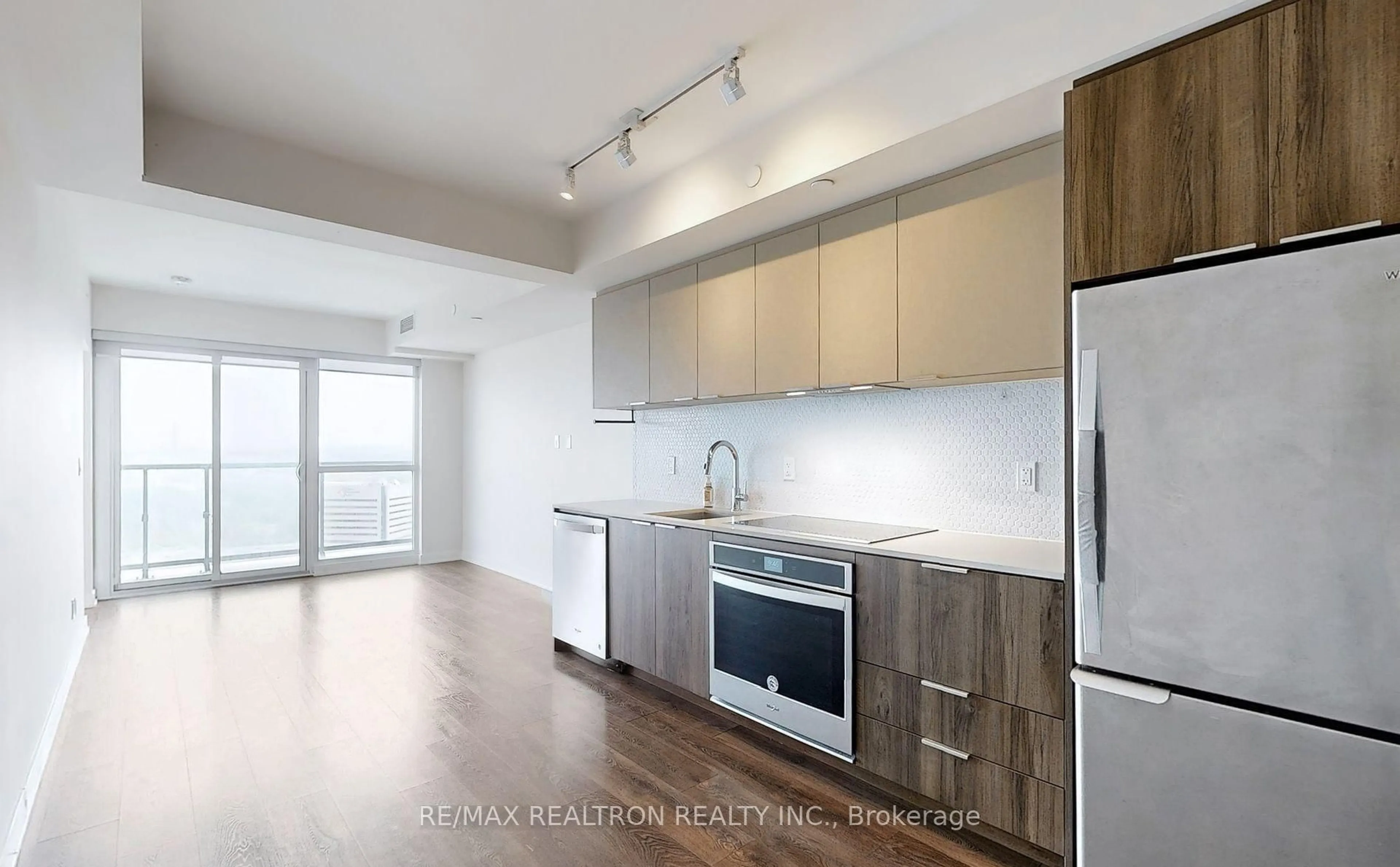 Standard kitchen, wood/laminate floor for 2 Sonic Way #2806, Toronto Ontario M3C 0P2