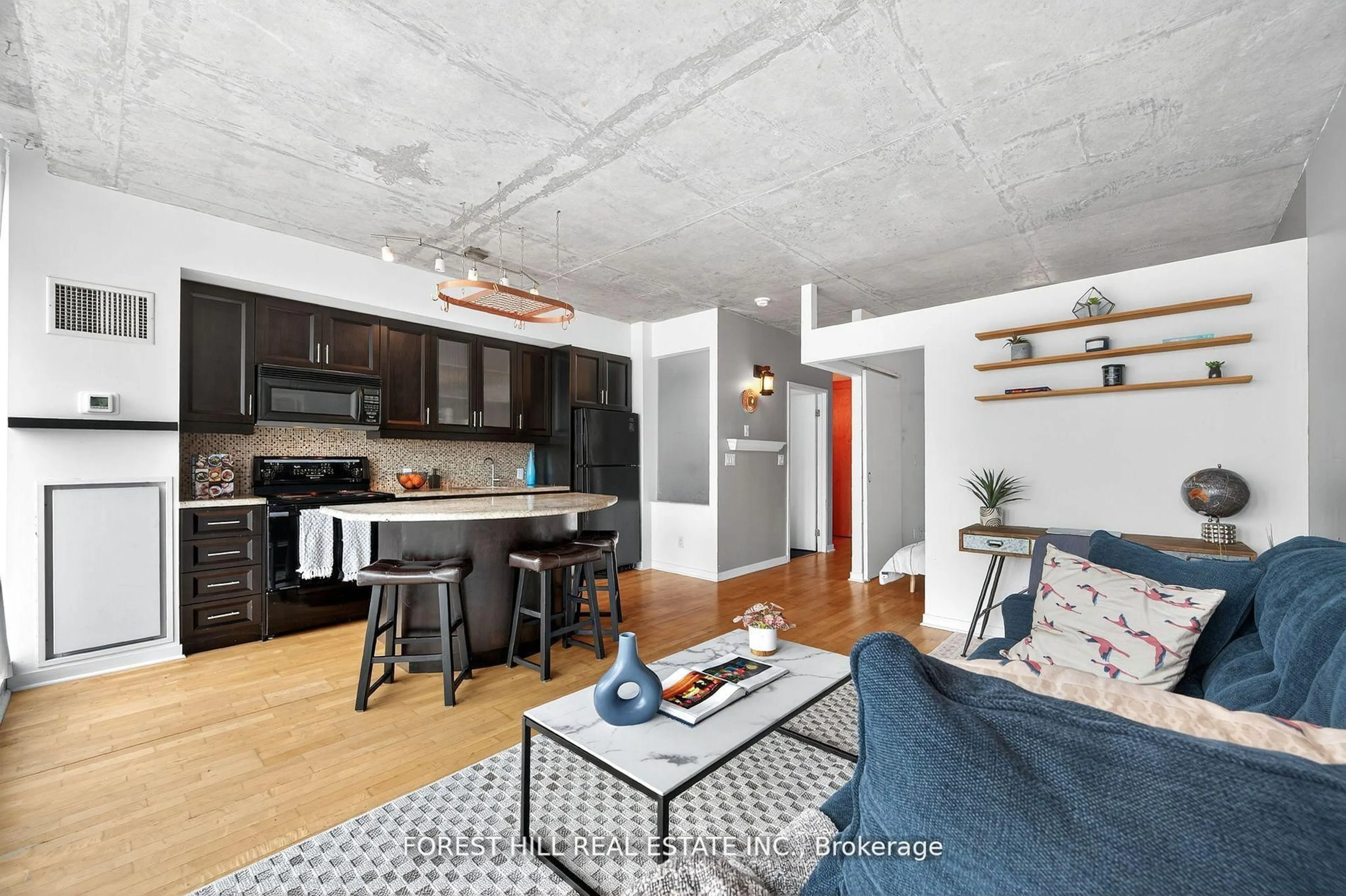 Open concept kitchen, cement floor for 301 Markham St #505, Toronto Ontario M6J 3X2