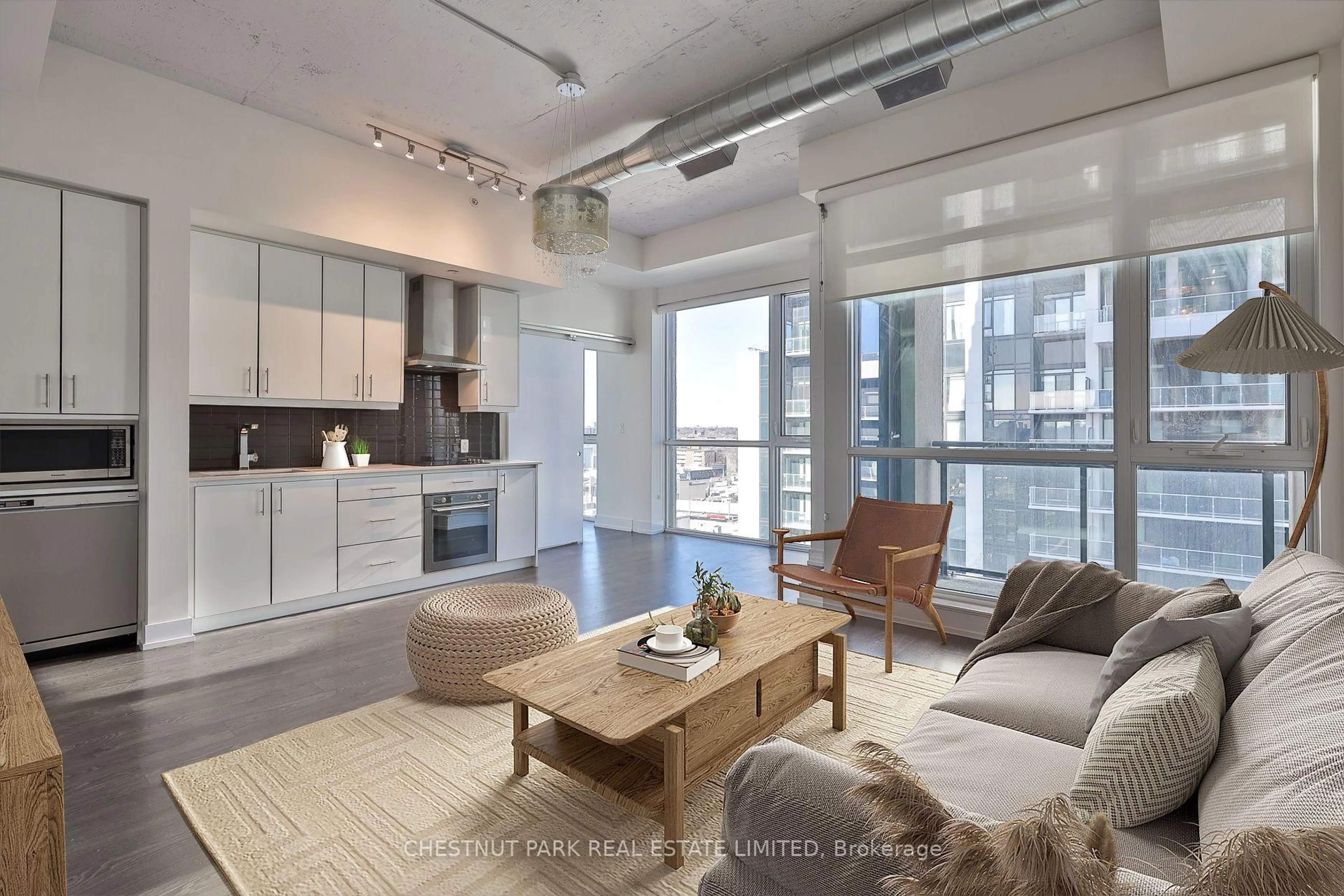 Living room with furniture, cement floor for 75 The Donway #603, Toronto Ontario M3C 2E9