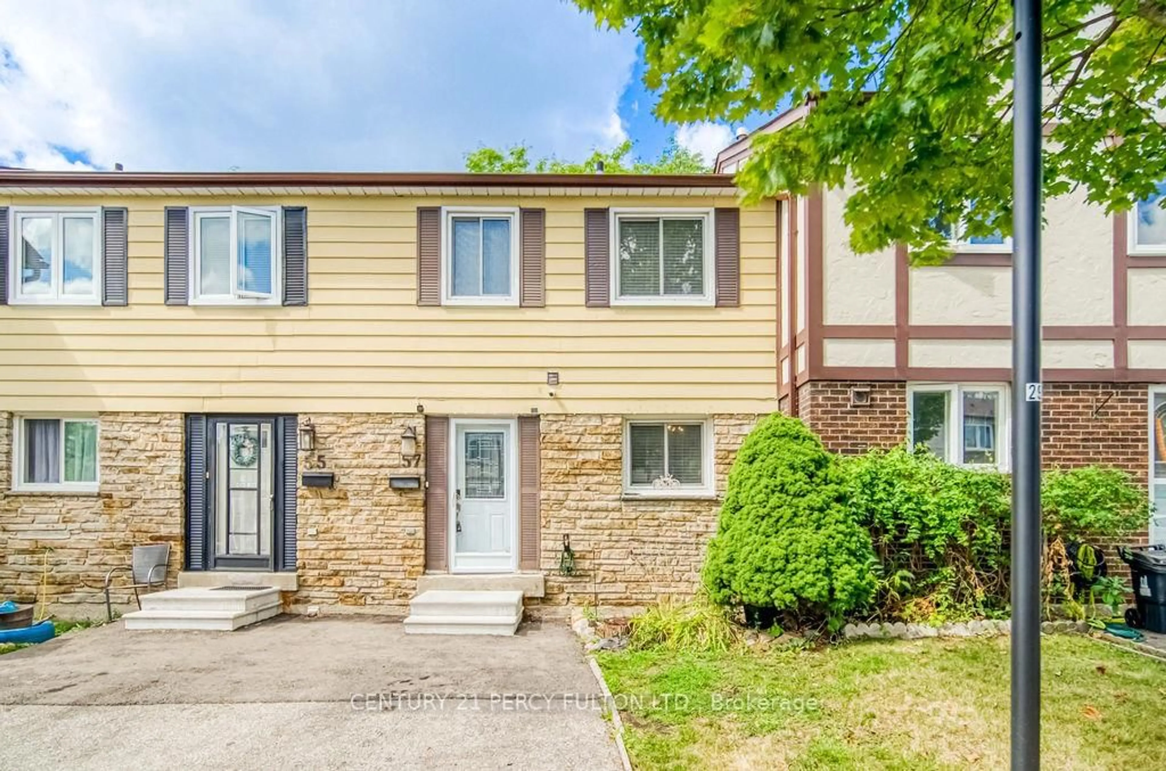 Home with vinyl exterior material, street for 57 Golden Appleway #111, Toronto Ontario M3A 3P2