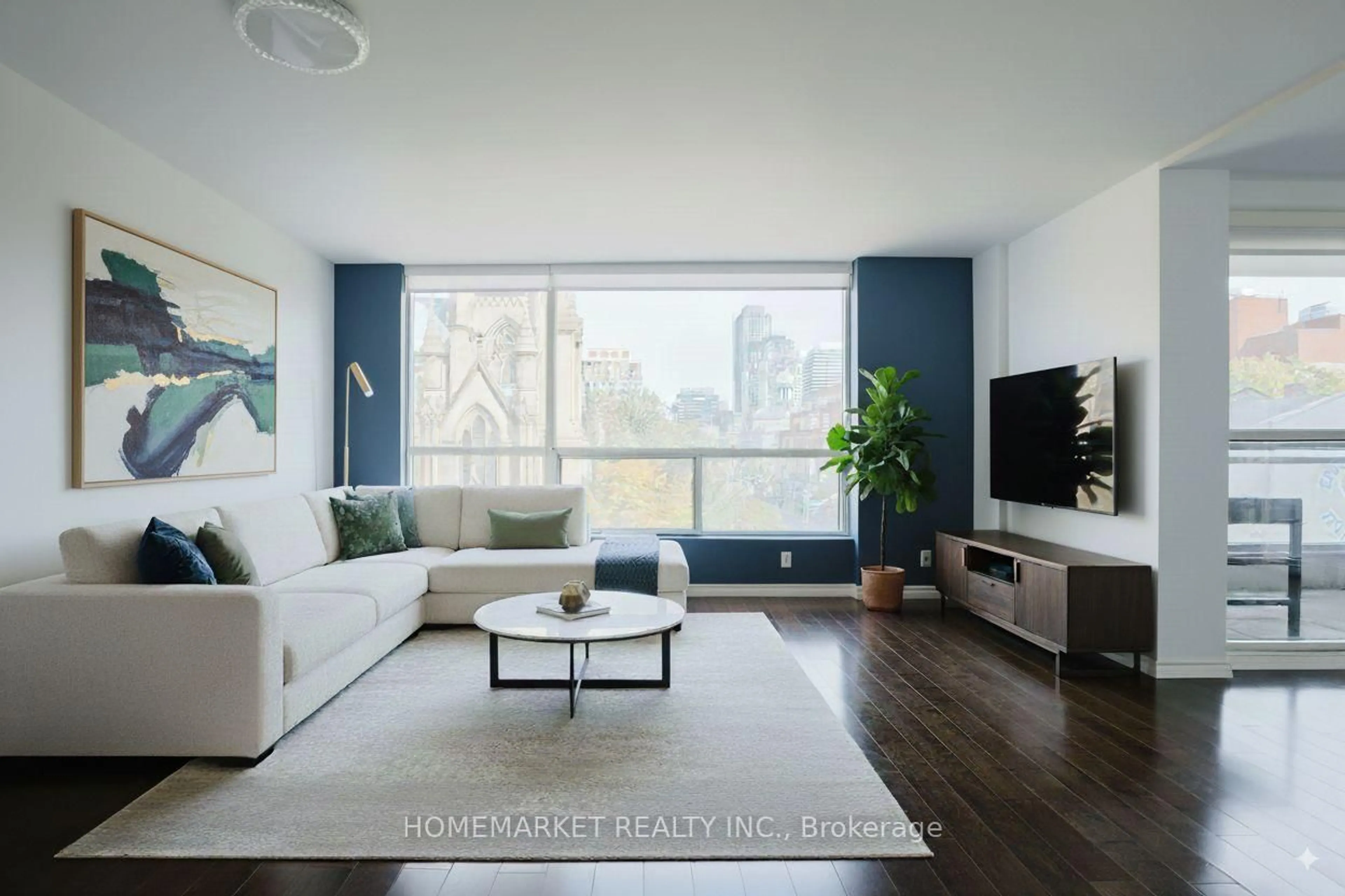 Living room with furniture, wood/laminate floor for 92 King St #411, Toronto Ontario M5C 2V8