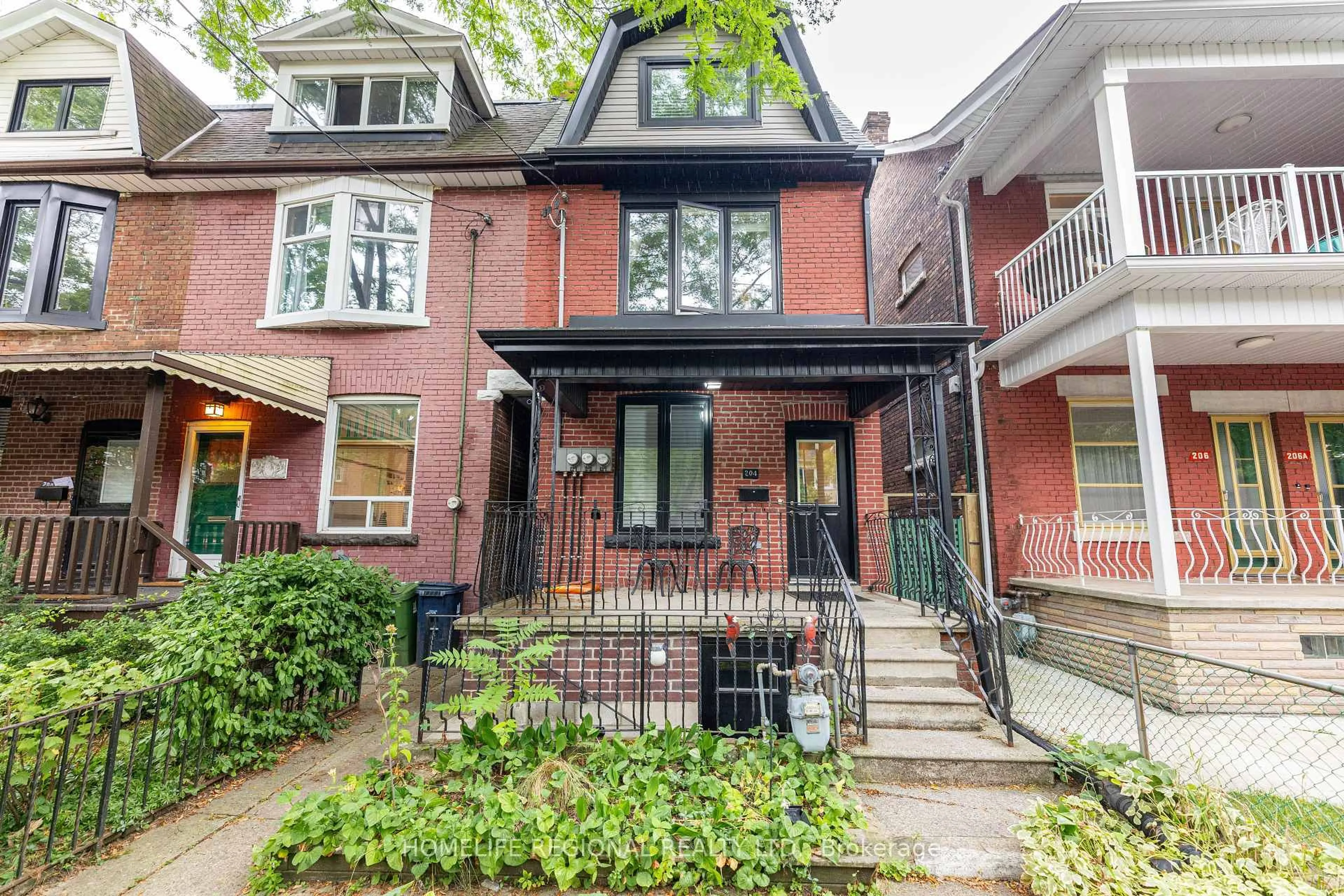 Home with brick exterior material, street for 204 Roxton Rd, Toronto Ontario M6J 2Y5