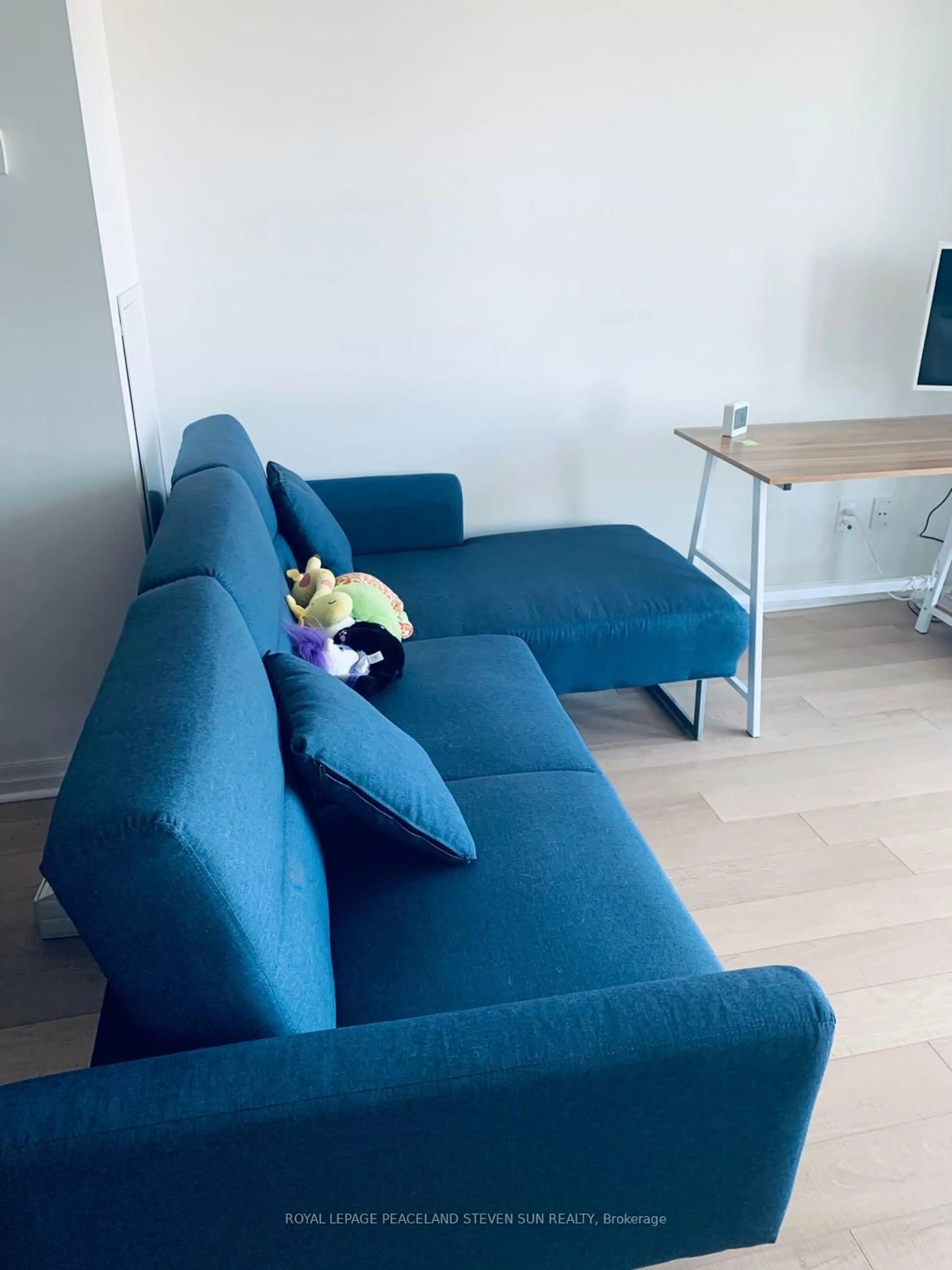 Living room with furniture, floor is not visible for 275 Yorkland Rd #1812, Toronto Ontario M2J 0B4
