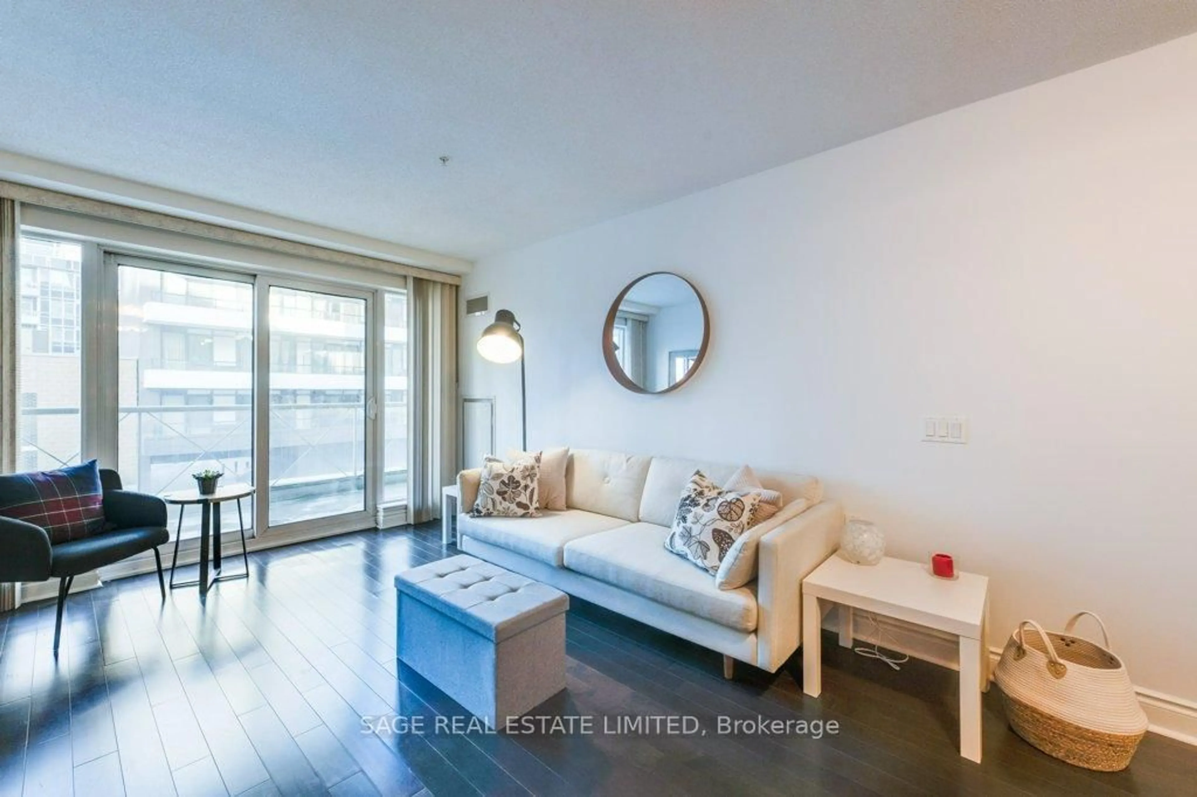 Living room with furniture, wood/laminate floor for 12 Rean Dr #307, Toronto Ontario M2K 3C6