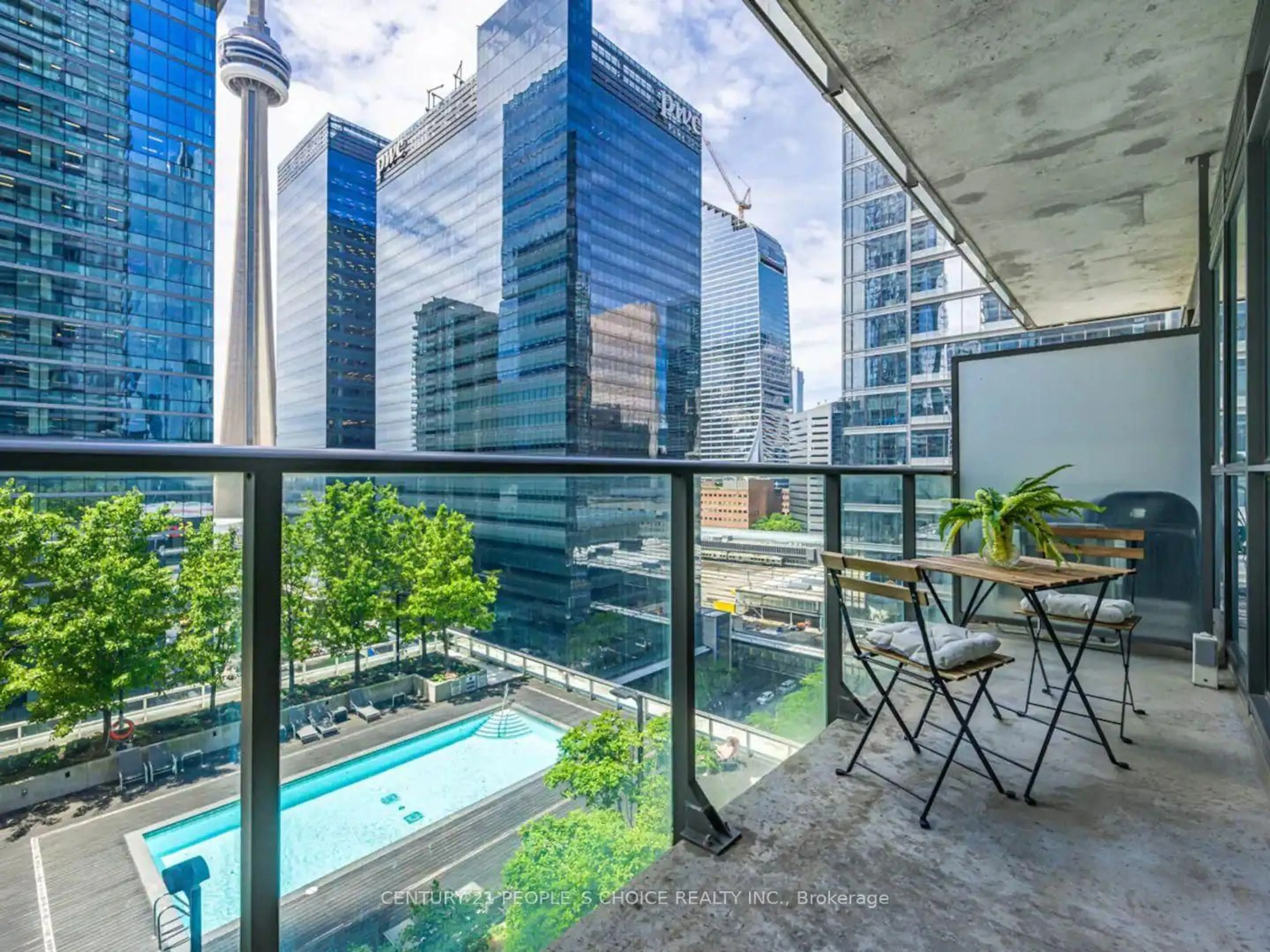 Patio, city buildings view from balcony for 65 Bremner Blvd #1203, Toronto Ontario M5J 0A7