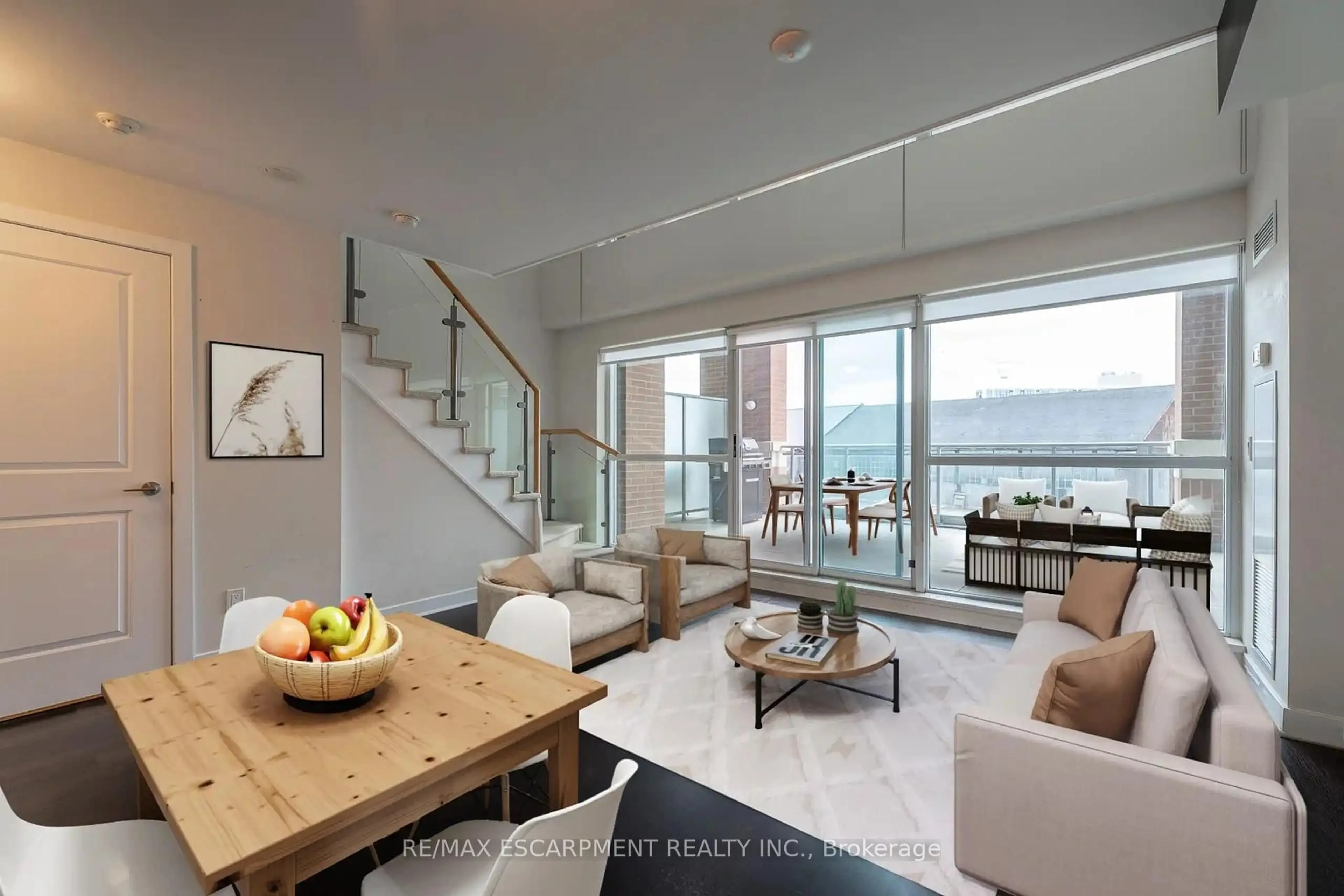 Living room with furniture, cement floor for 100 Western Battery Rd #216, Toronto Ontario M6K 3S2
