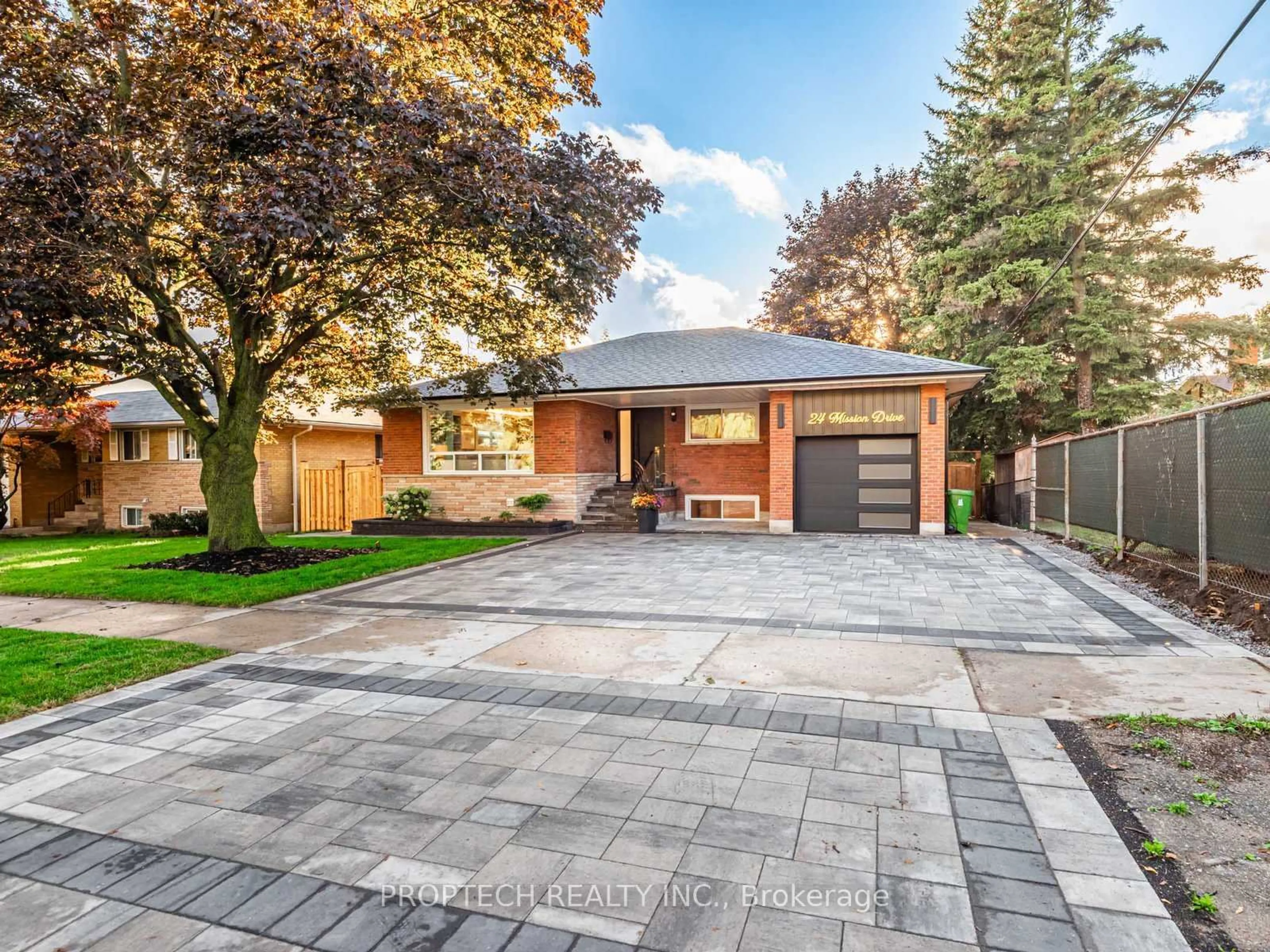 Home with brick exterior material, street for 24 Mission Dr, Toronto Ontario M3A 2P2