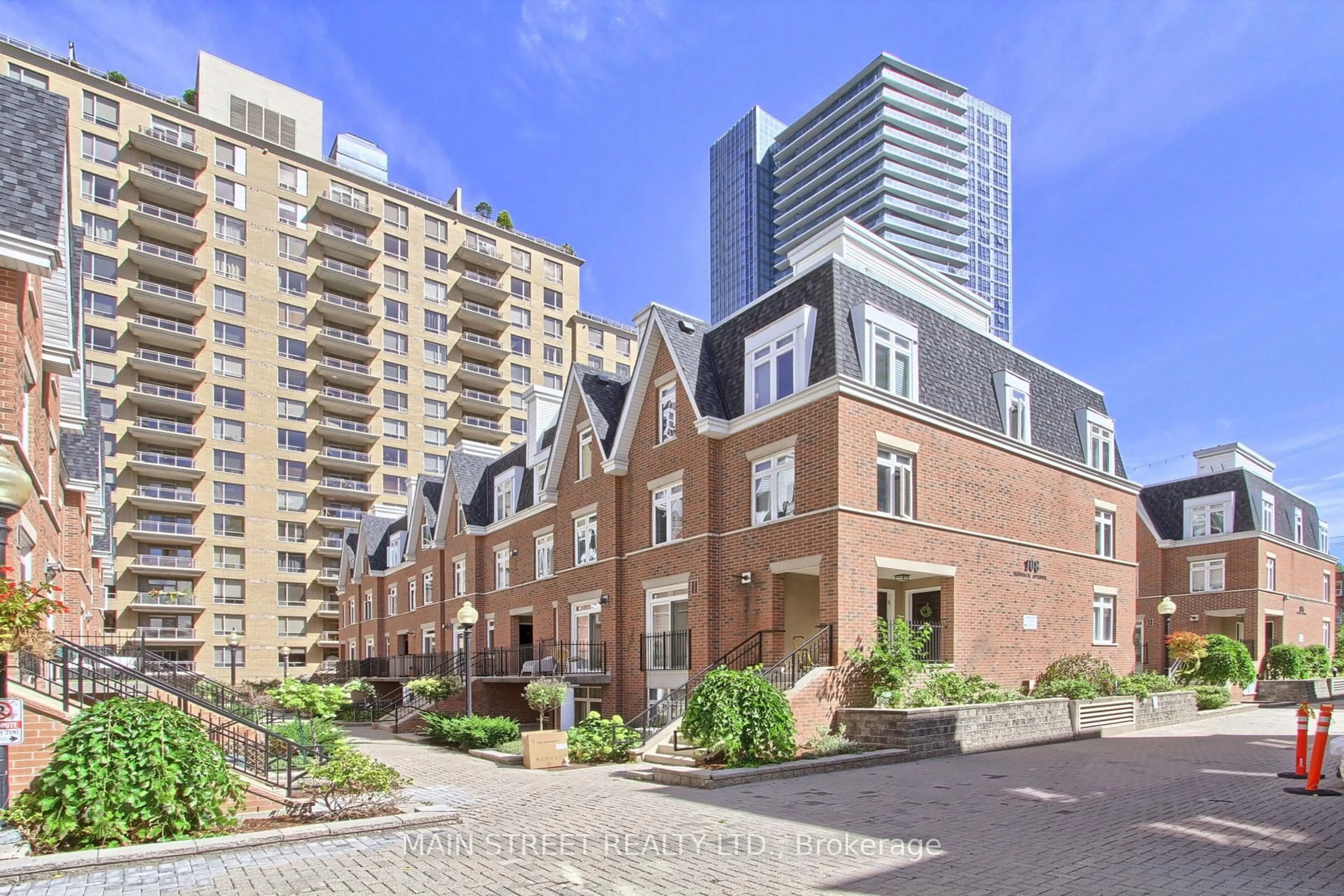 Home with brick exterior material, city buildings view from balcony for 108 Redpath Ave #25, Toronto Ontario M4S 2J7