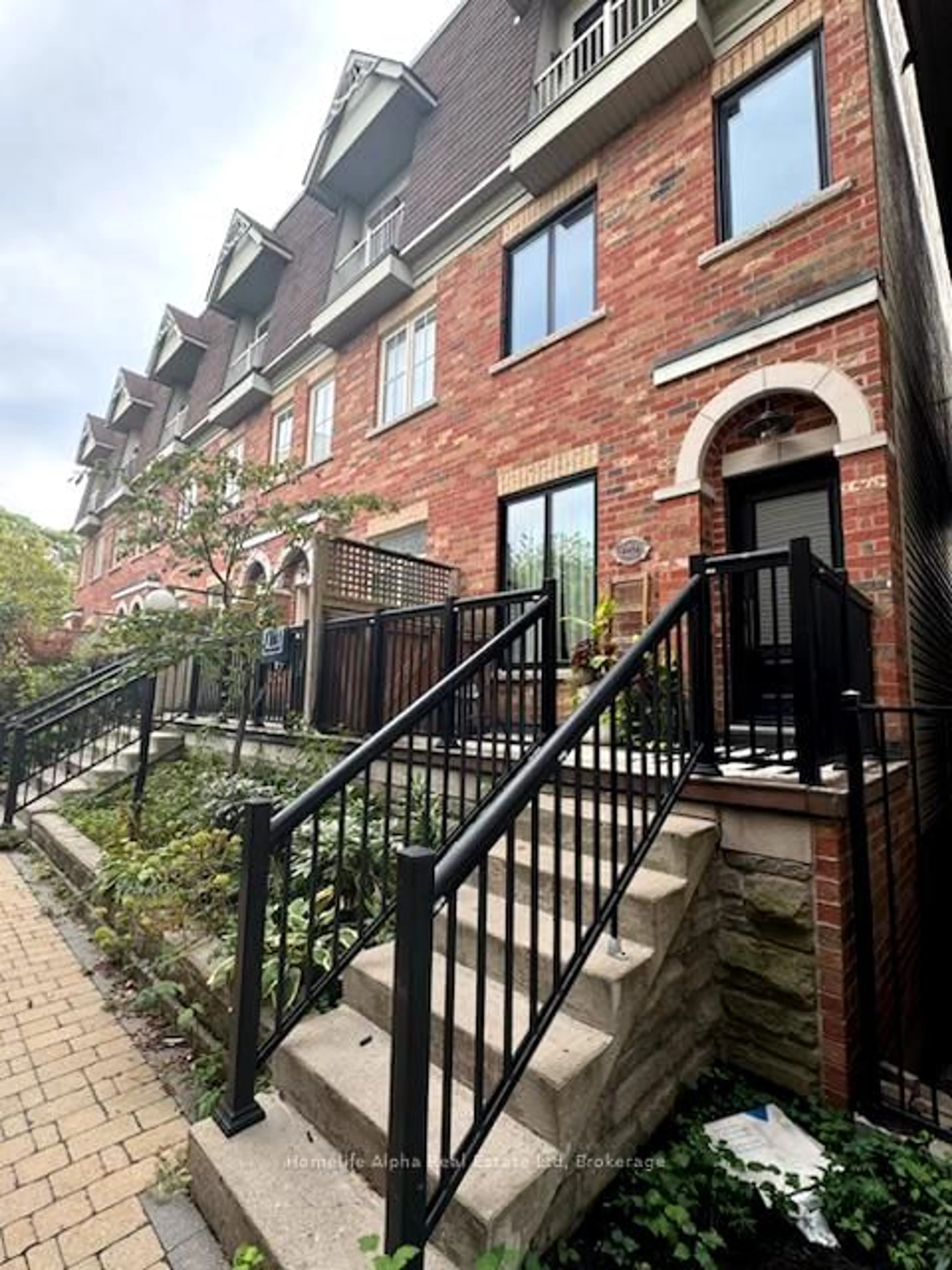 Home with brick exterior material, street for 445 B Queen St, Toronto Ontario M5A 1T6