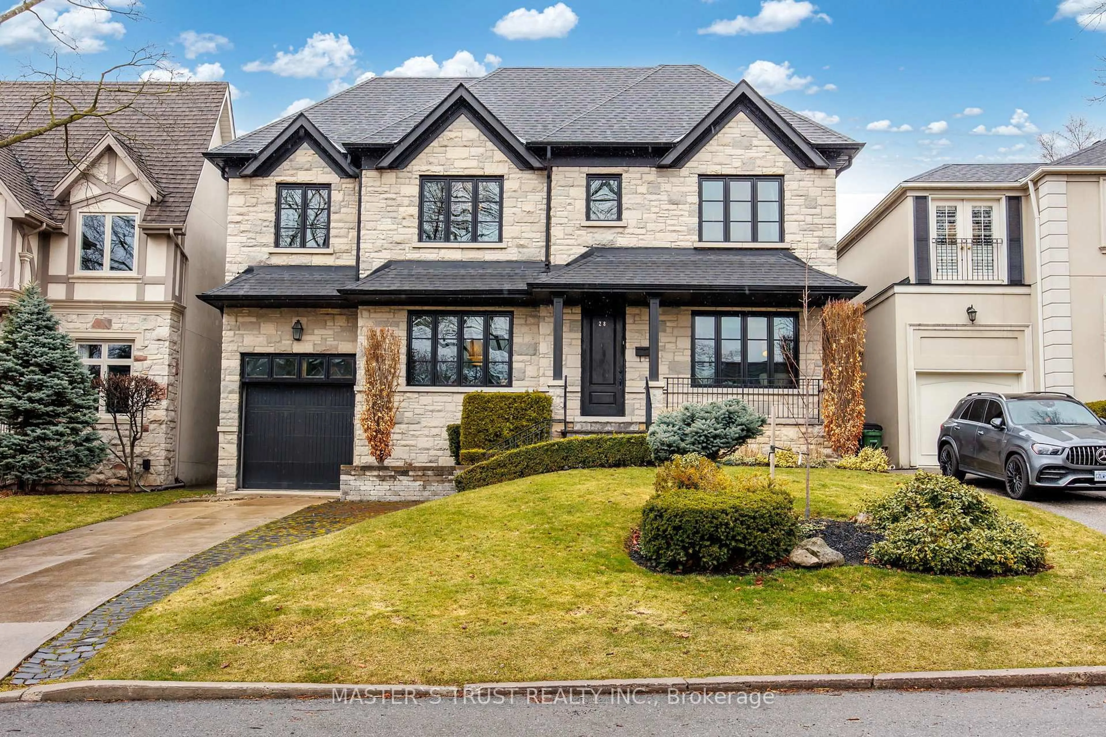 Home with brick exterior material, street for 28 Forest Ridge Dr, Toronto Ontario M6B 1H3