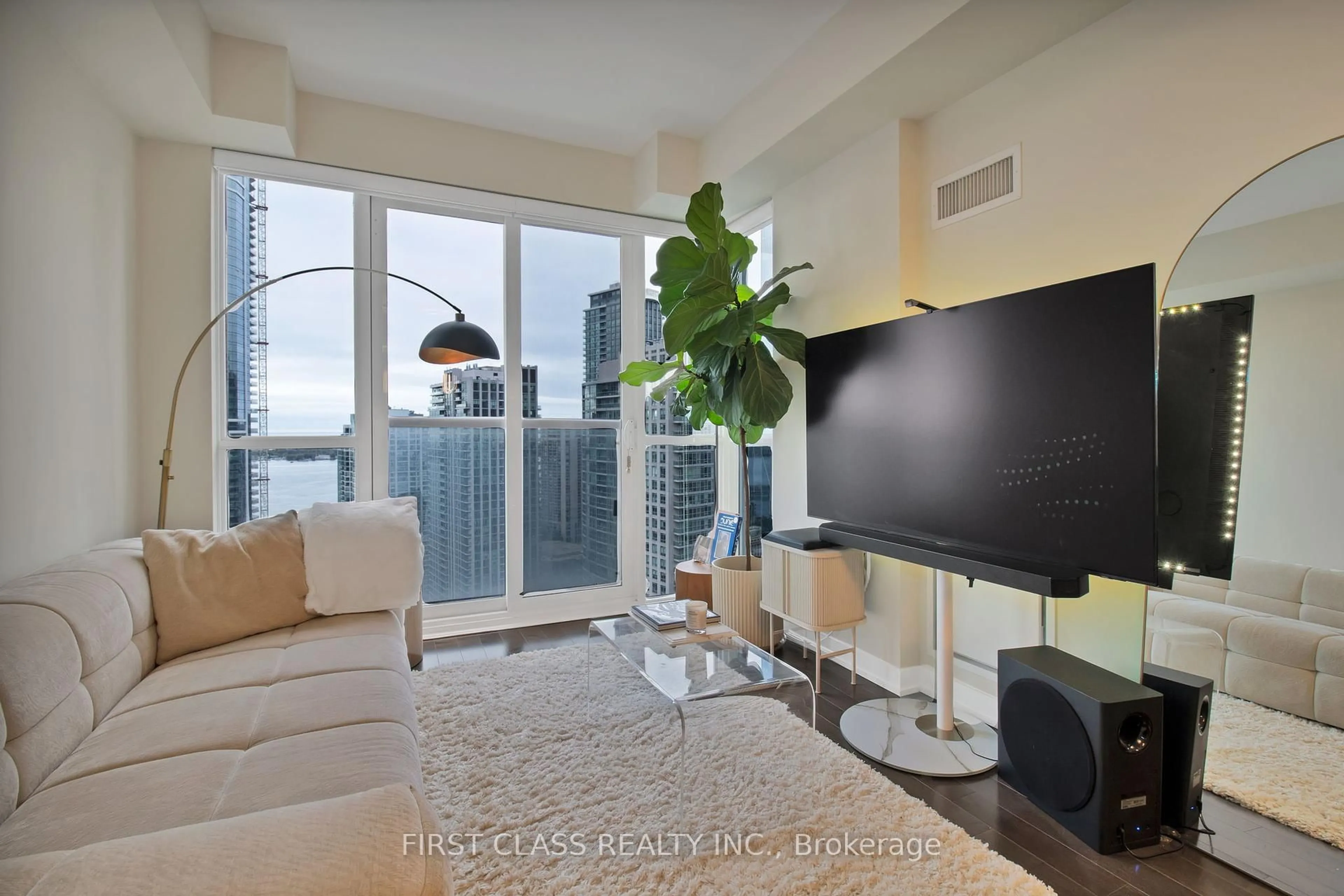 Living room with furniture, unknown for 1 The Esplanade Ave #3309, Toronto Ontario M5E 0A8