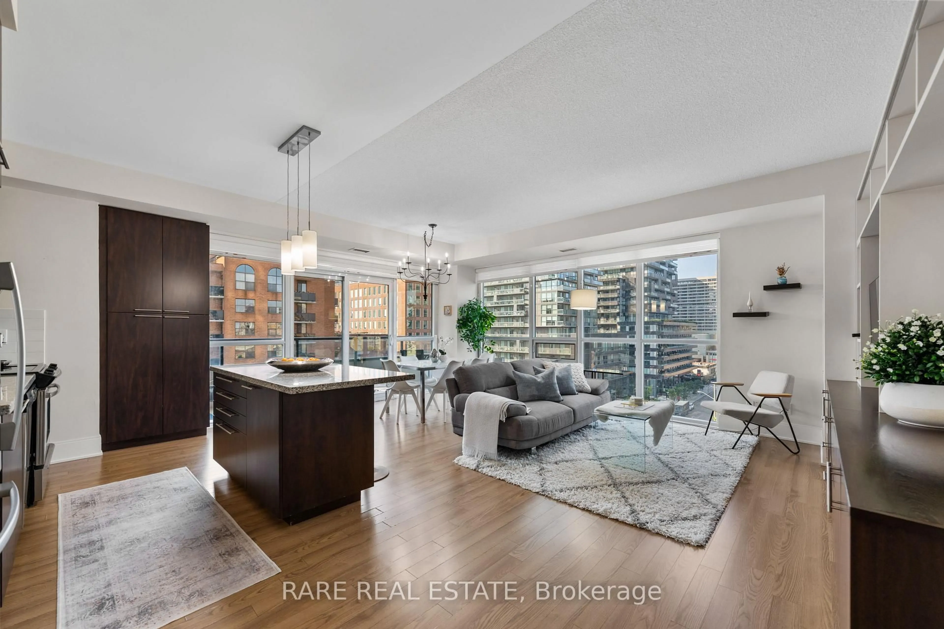 Living room with furniture, unknown for 70 Roehampton Ave #715, Toronto Ontario M4P 1R2