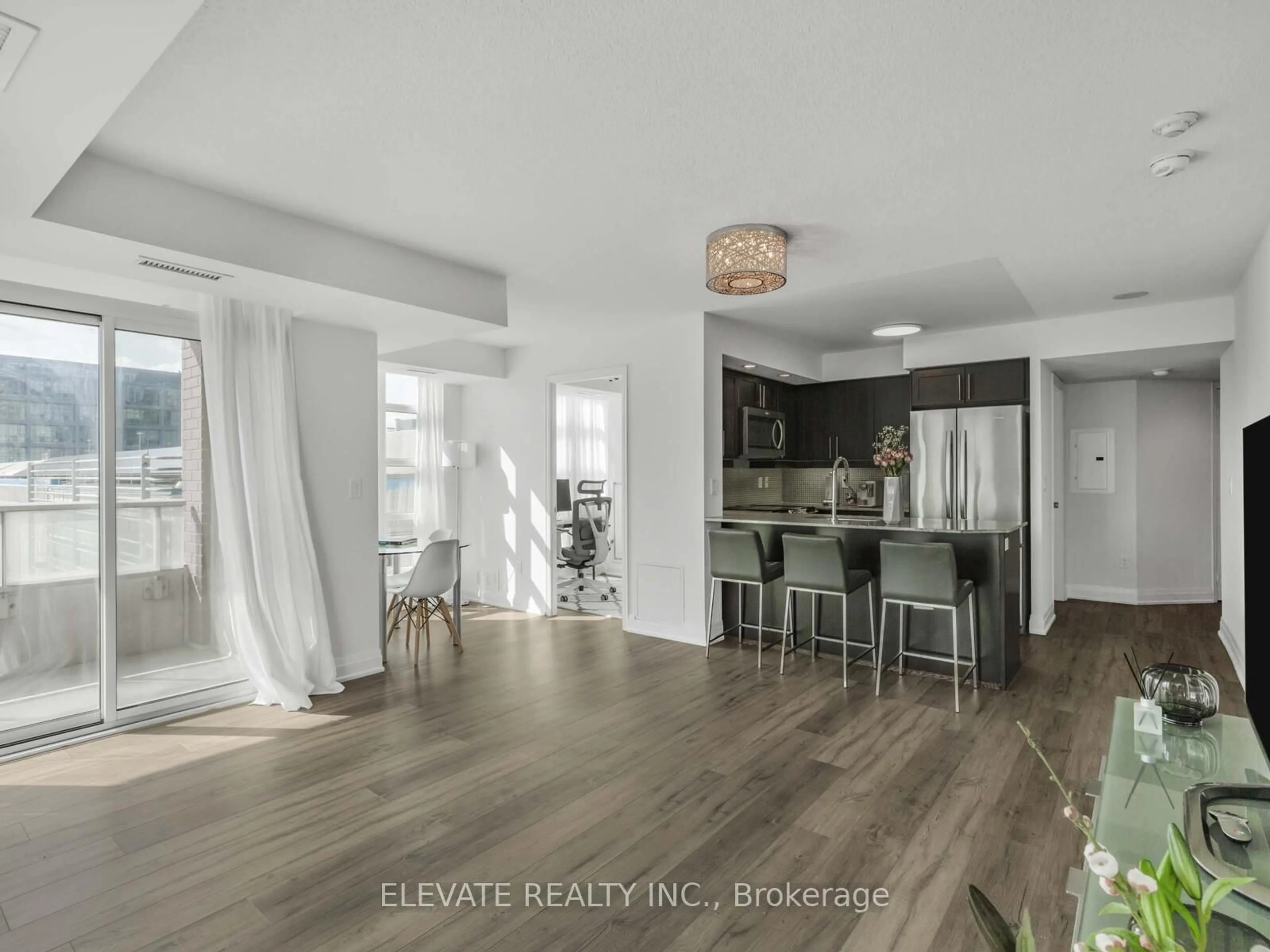 Open concept kitchen, wood/laminate floor for 85 East Liberty St #404, Toronto Ontario M6K 3R4
