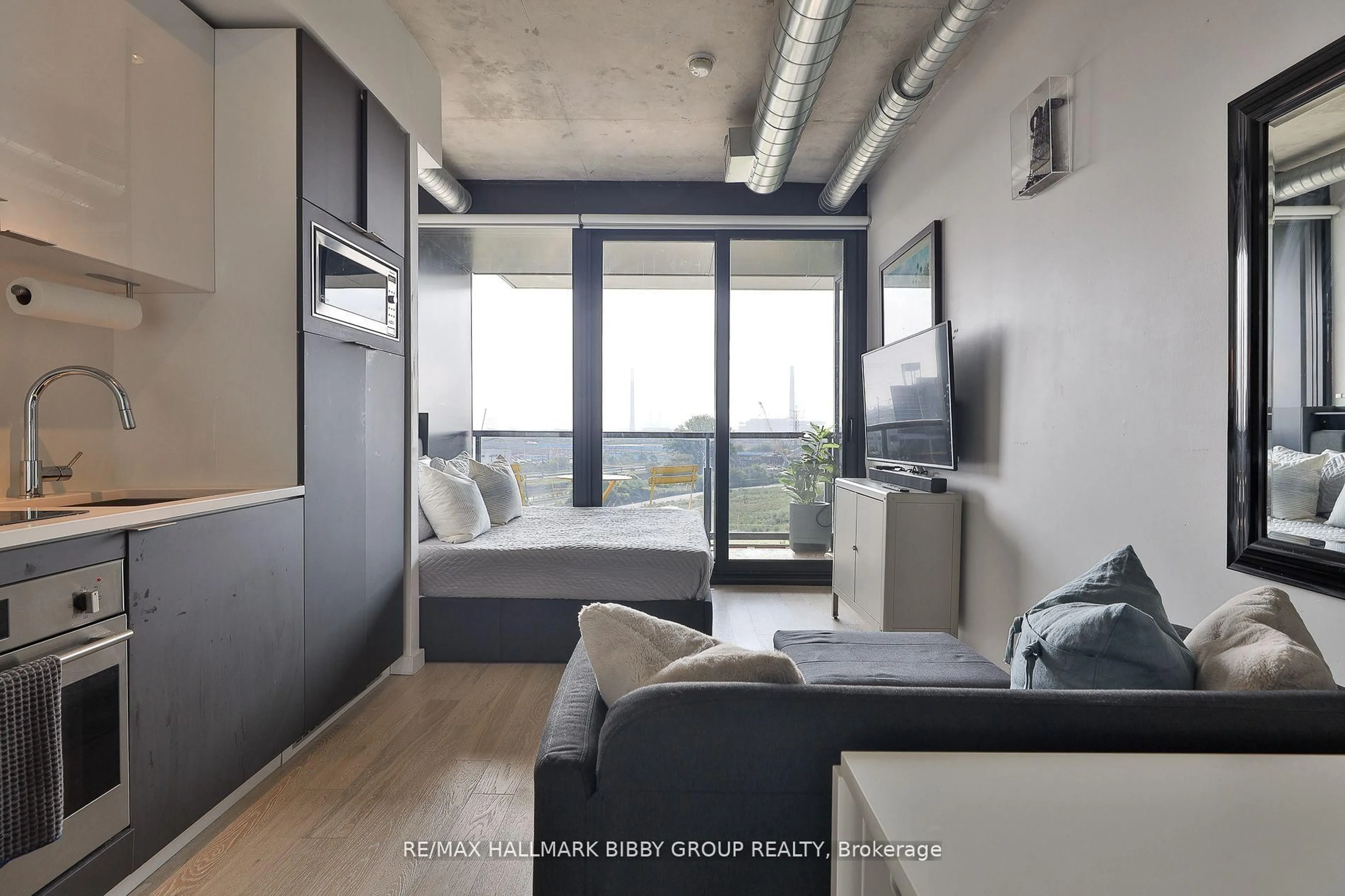 Living room with furniture, unknown for 170 Bayview Ave #614, Toronto Ontario M5A 1H7