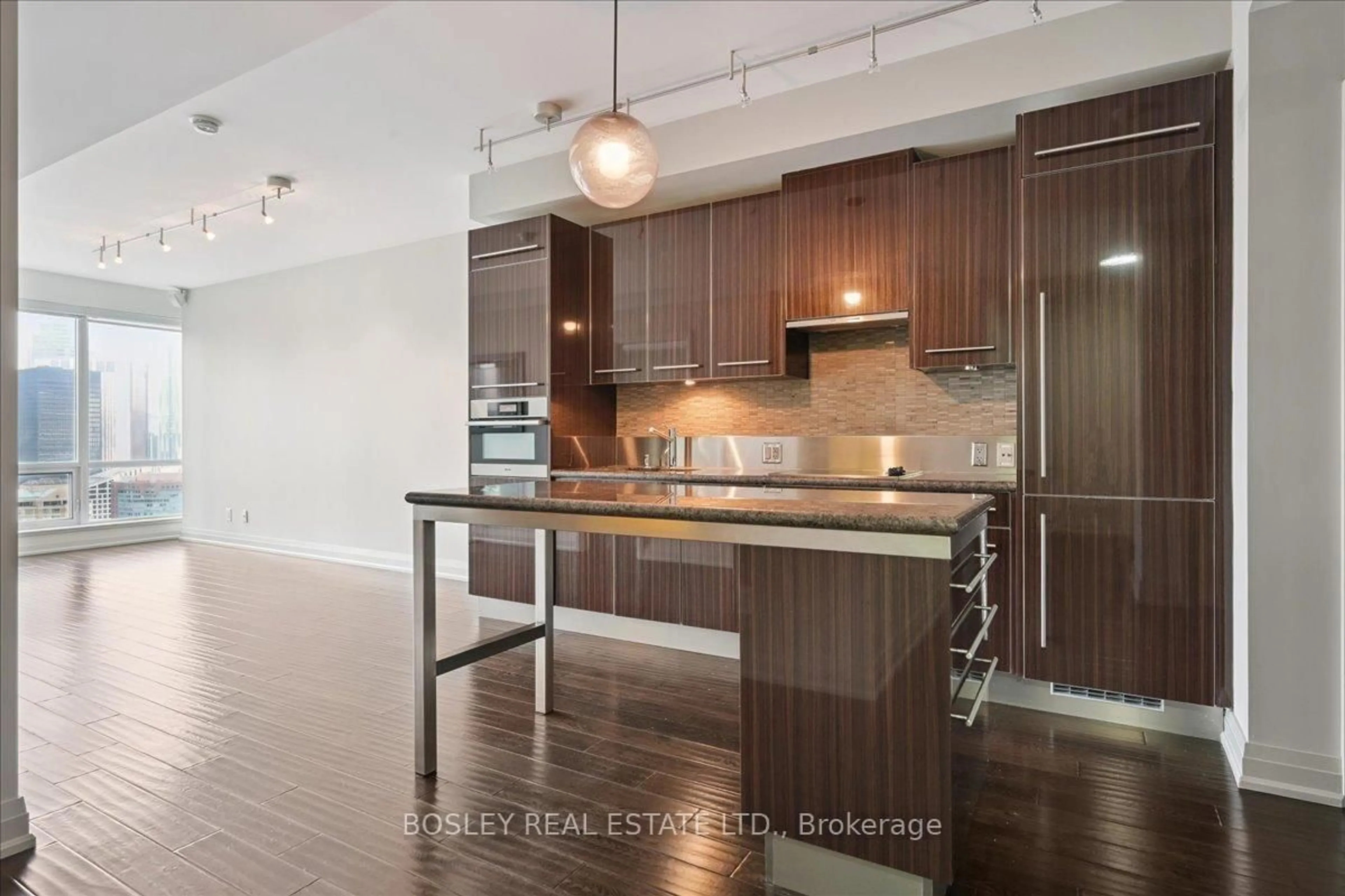 Open concept kitchen, wood/laminate floor for 80 John St #3210, Toronto Ontario M5V 3X4