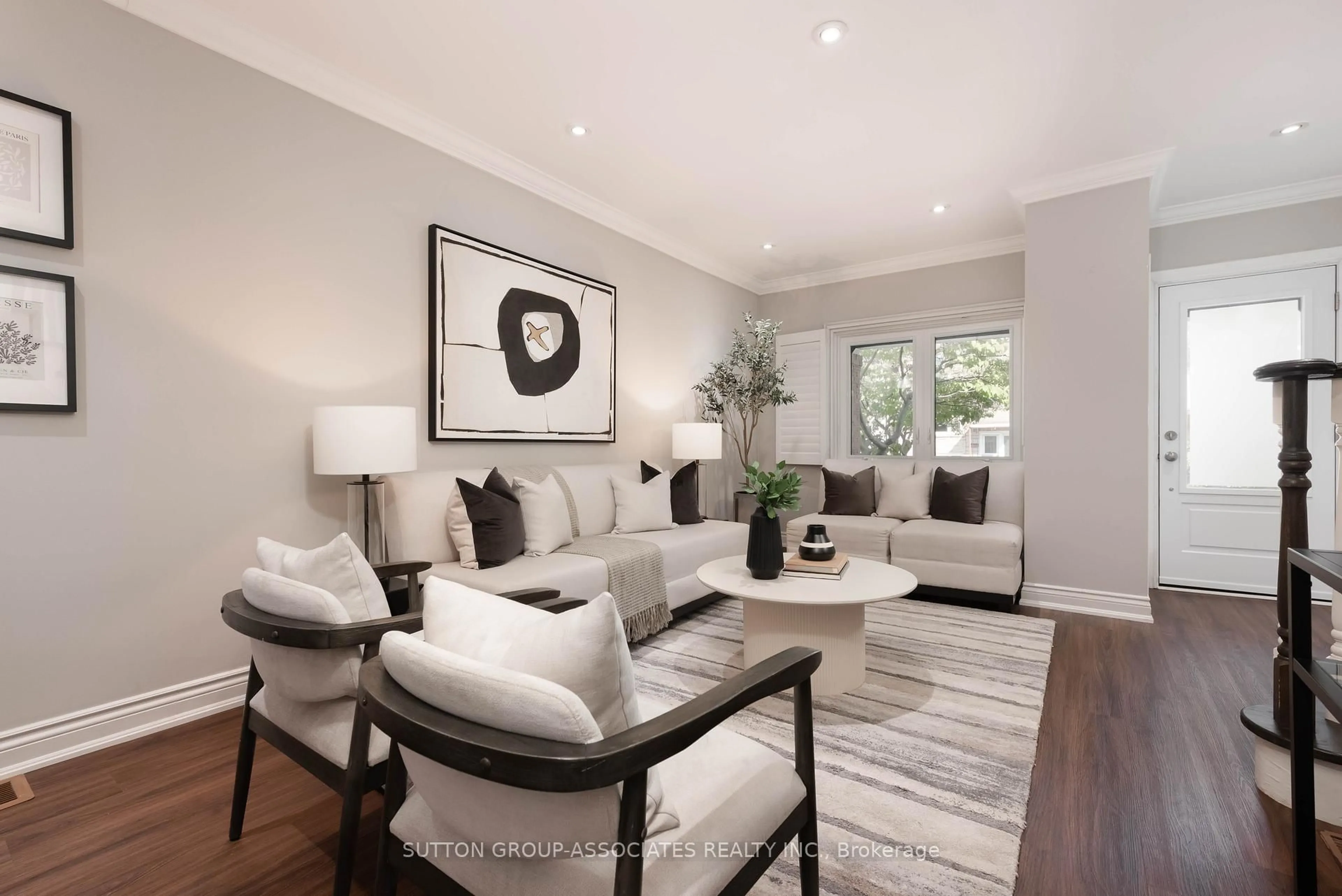 Living room with furniture, wood/laminate floor for 138A Cedric Ave, Toronto Ontario M6C 3X8