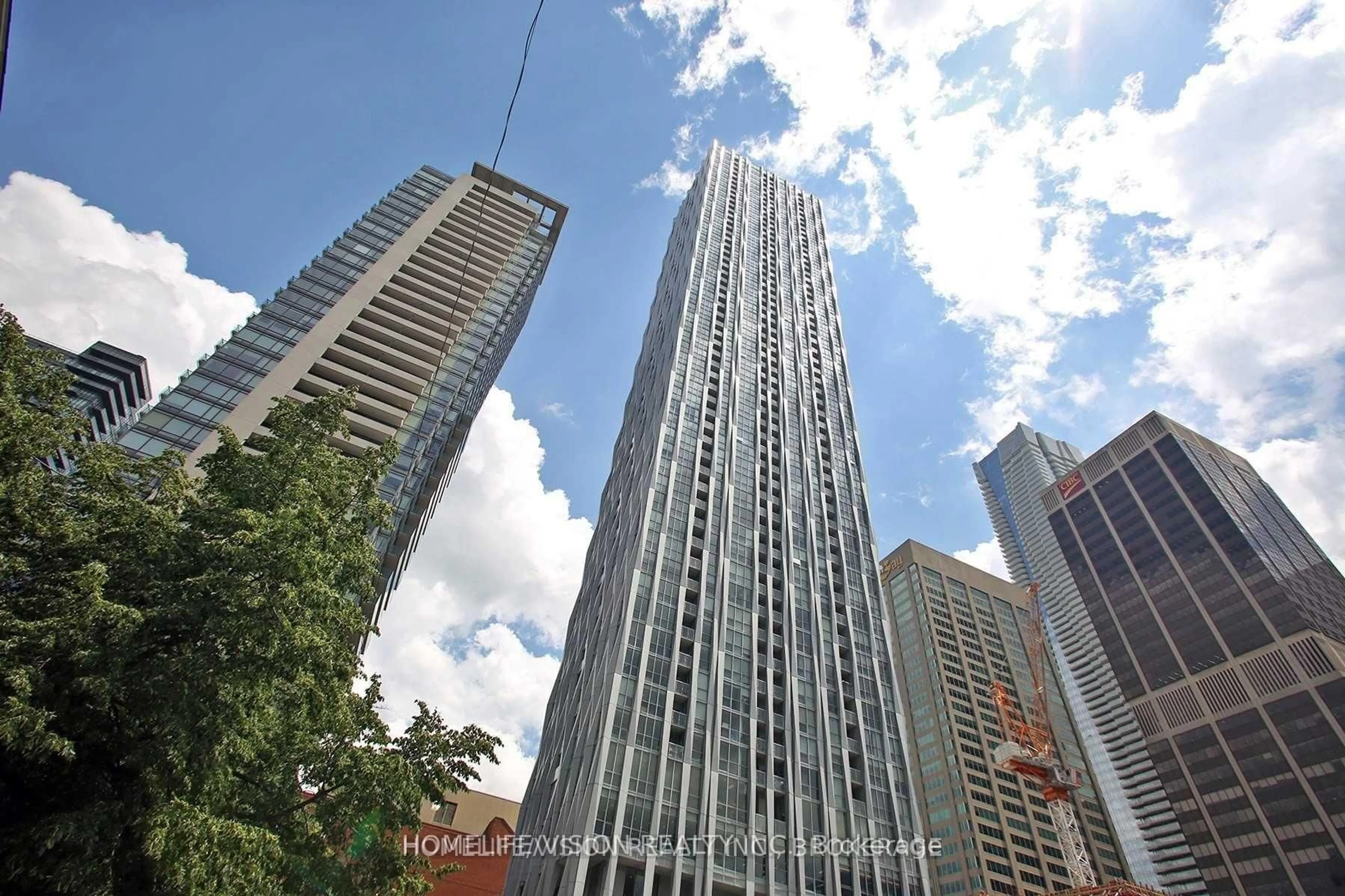 A pic from outside/outdoor area/front of a property/back of a property/a pic from drone, city buildings view from balcony for 1 Yorkville Ave #2009, Toronto Ontario M4W 0B1