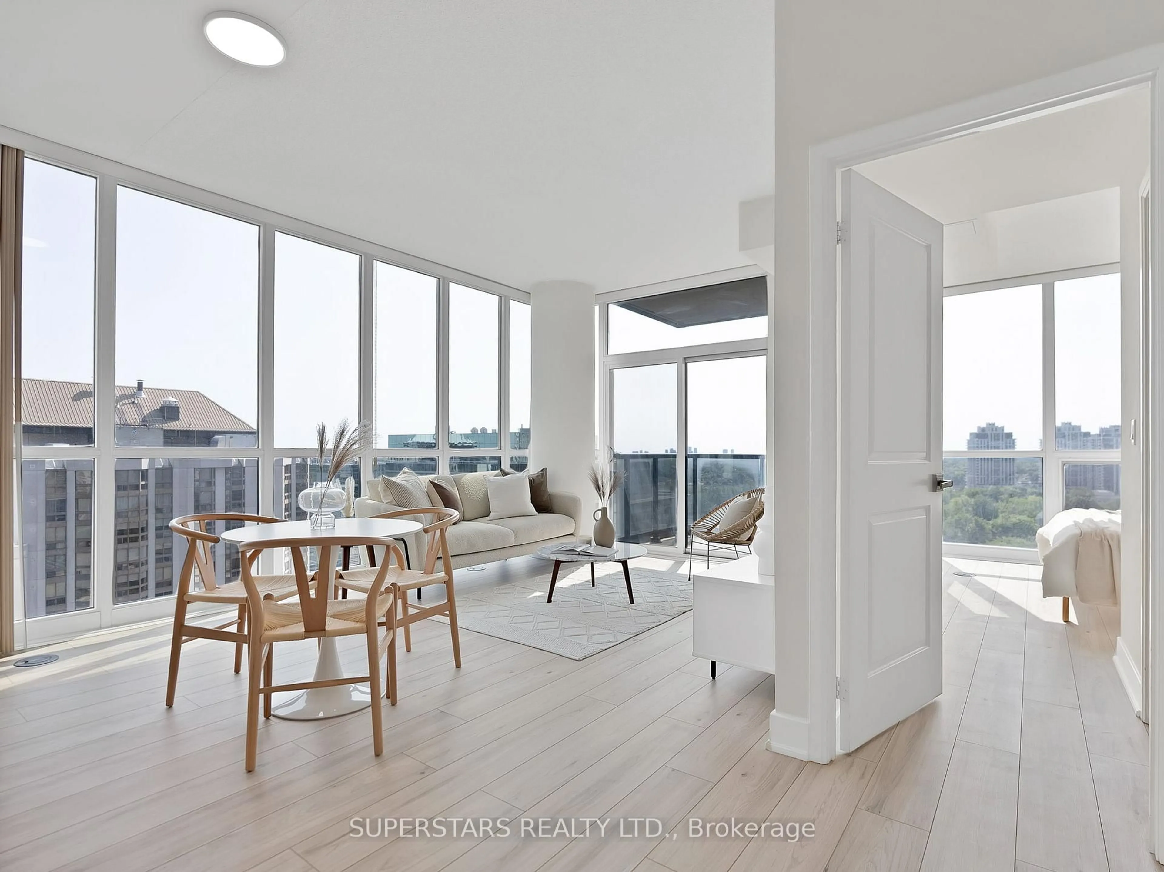 Living room with furniture, wood/laminate floor for 88 Sheppard Ave #1802, Toronto Ontario M2N 0G9