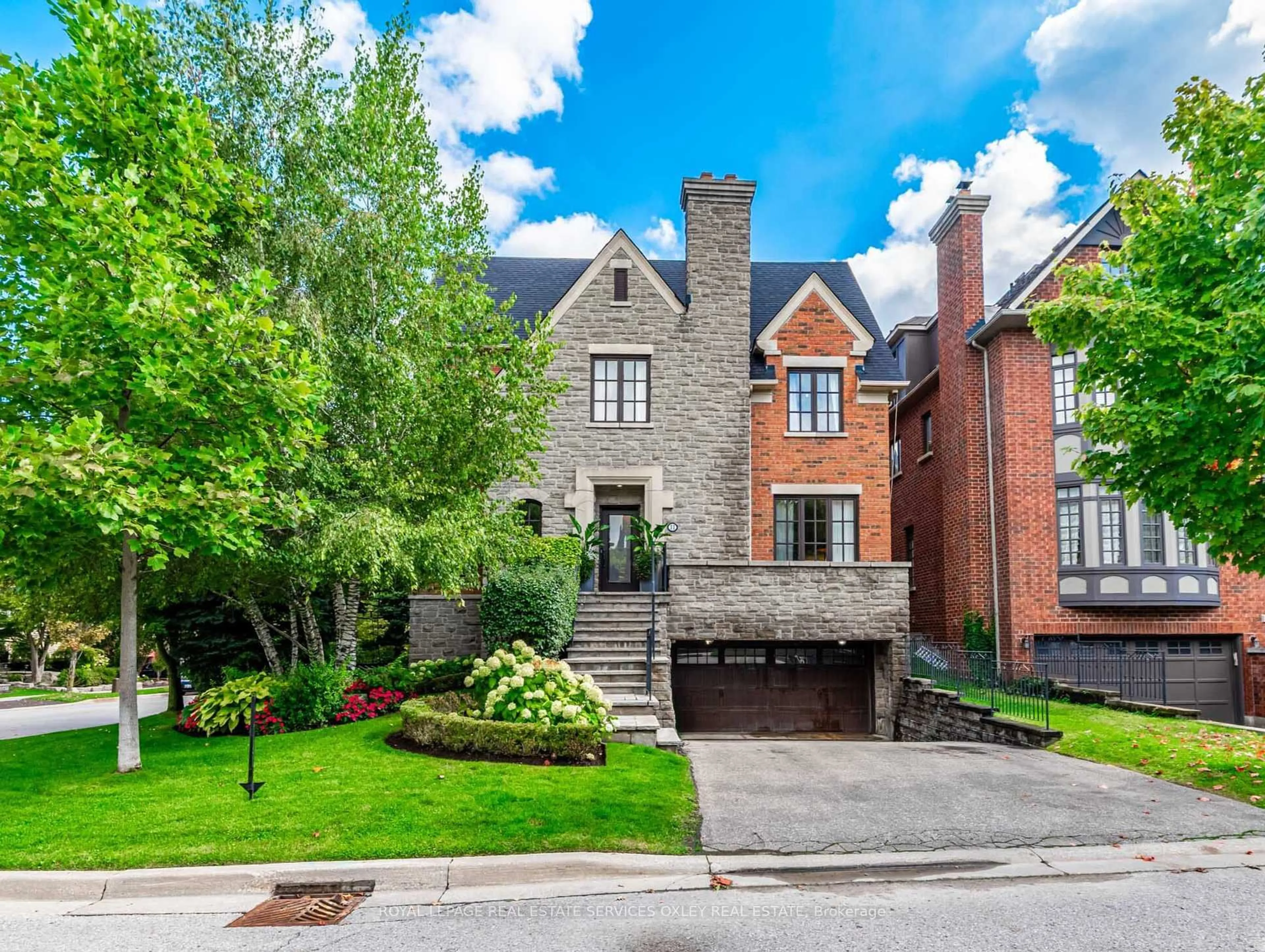 Home with brick exterior material, street for 11 True Davidson Dr, Toronto Ontario M4W 3X2