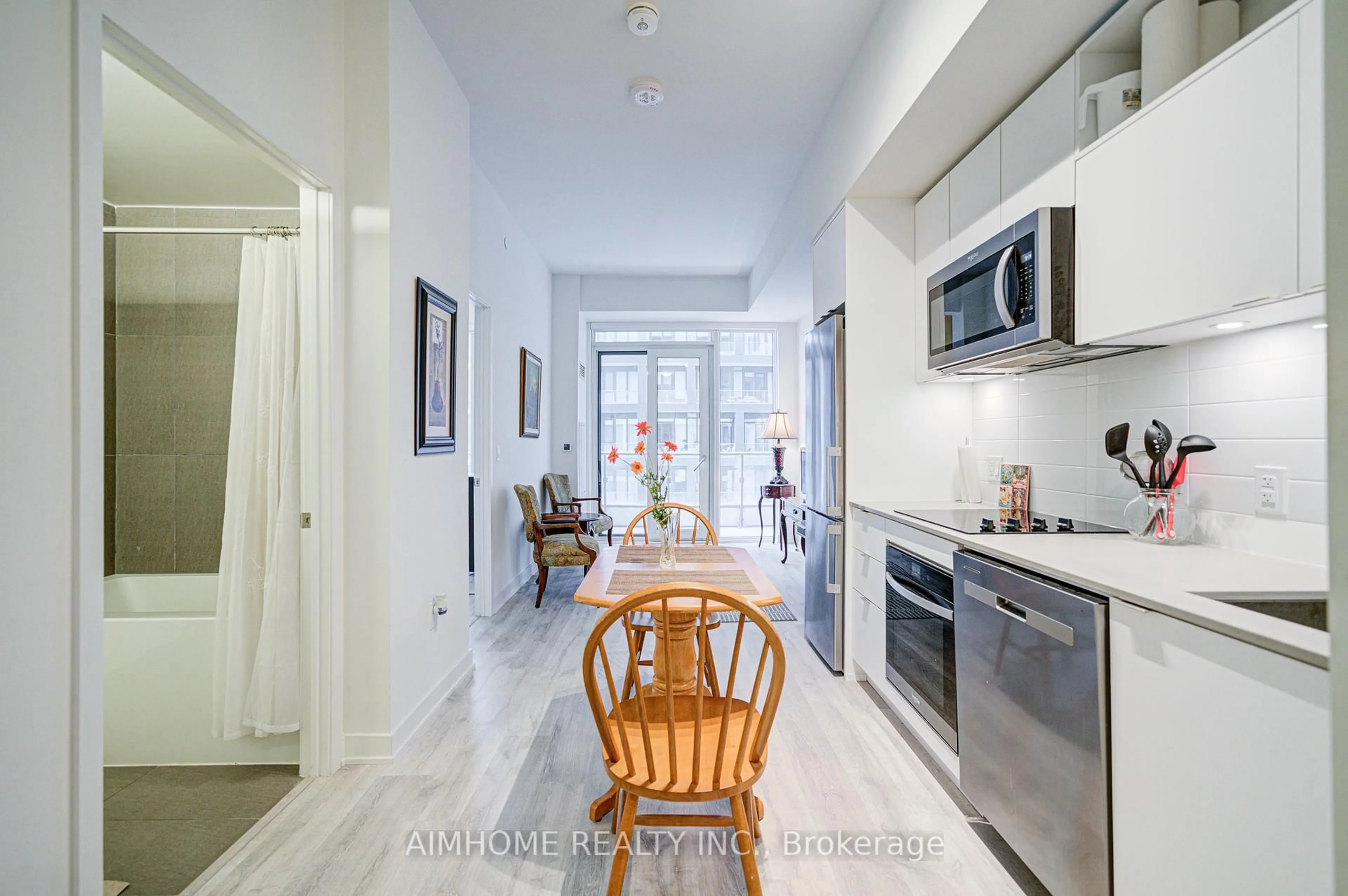 Open concept kitchen, ceramic/tile floor for 70 Princess St #1723, Toronto Ontario M5A 0X6