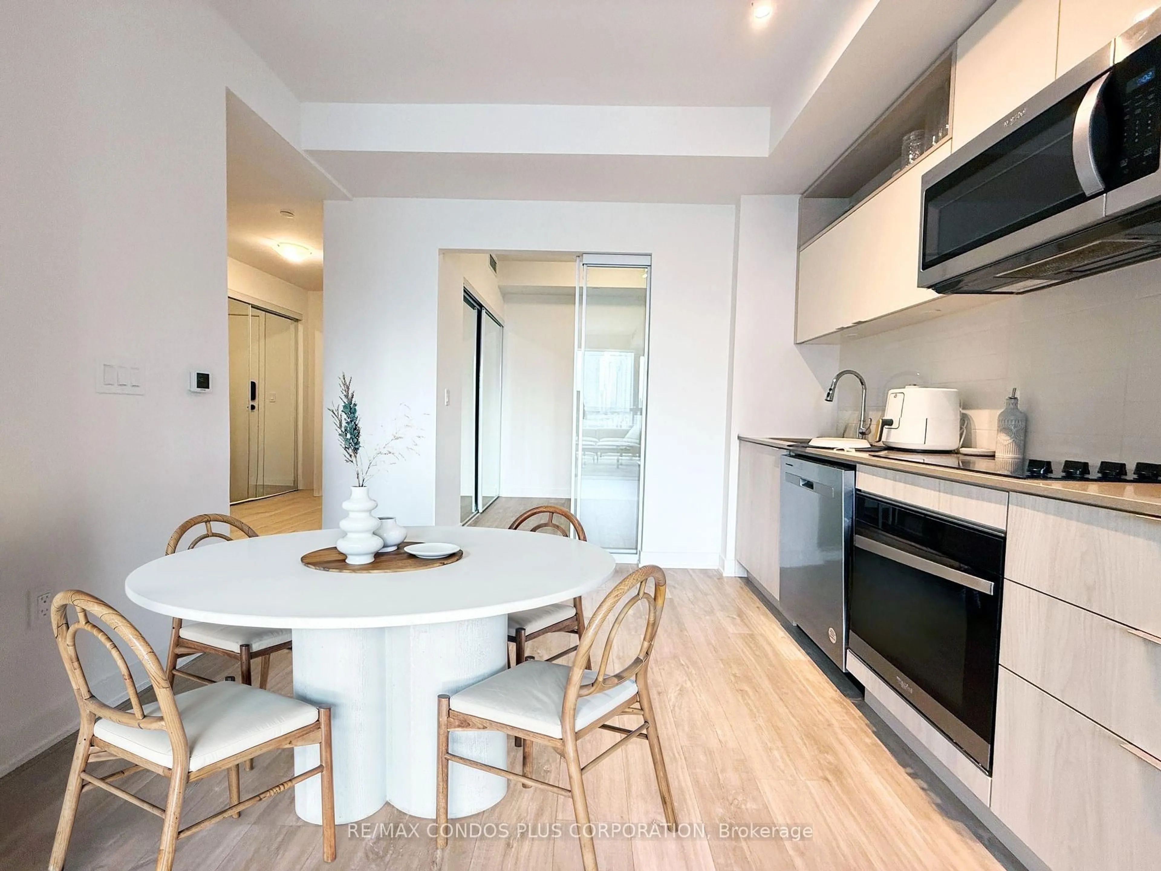 Open concept kitchen, wood/laminate floor for 135 Lower Sherbourne St #2230, Toronto Ontario M5A 1Y4