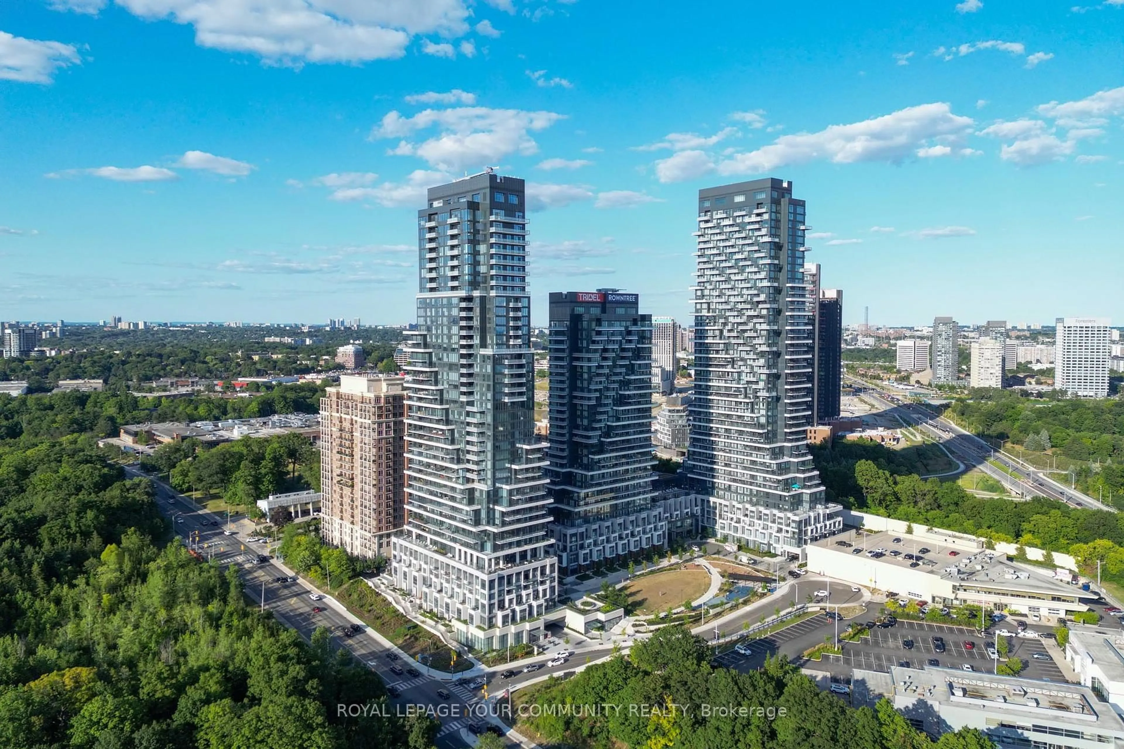 A pic from outside/outdoor area/front of a property/back of a property/a pic from drone, city buildings view from balcony for 10 Inn on the Park Dr #101, Toronto Ontario M3C 0P9