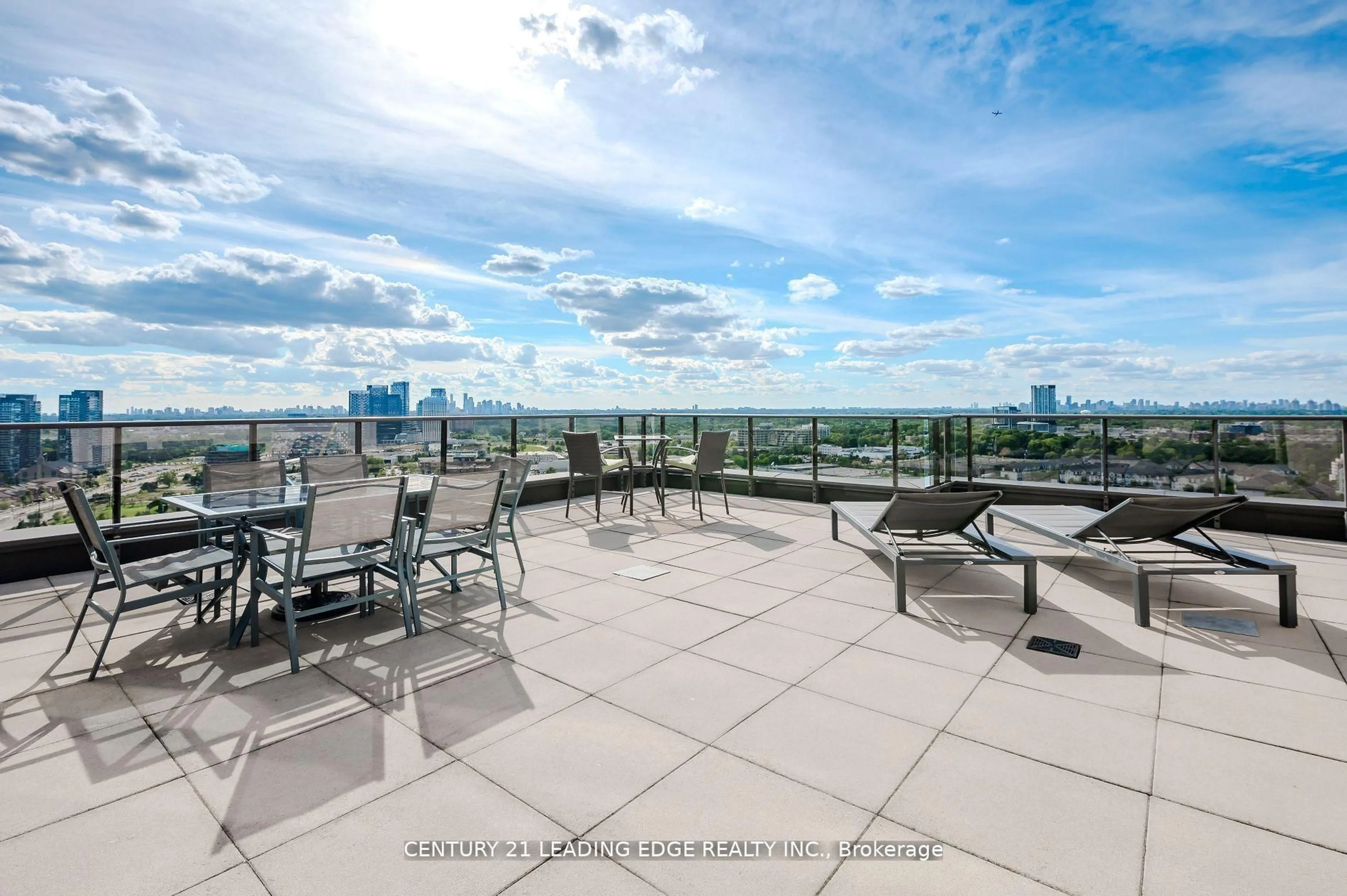 Patio, city buildings view from balcony for 135 Wynford Dr #PH303, Toronto Ontario M3C 0J4