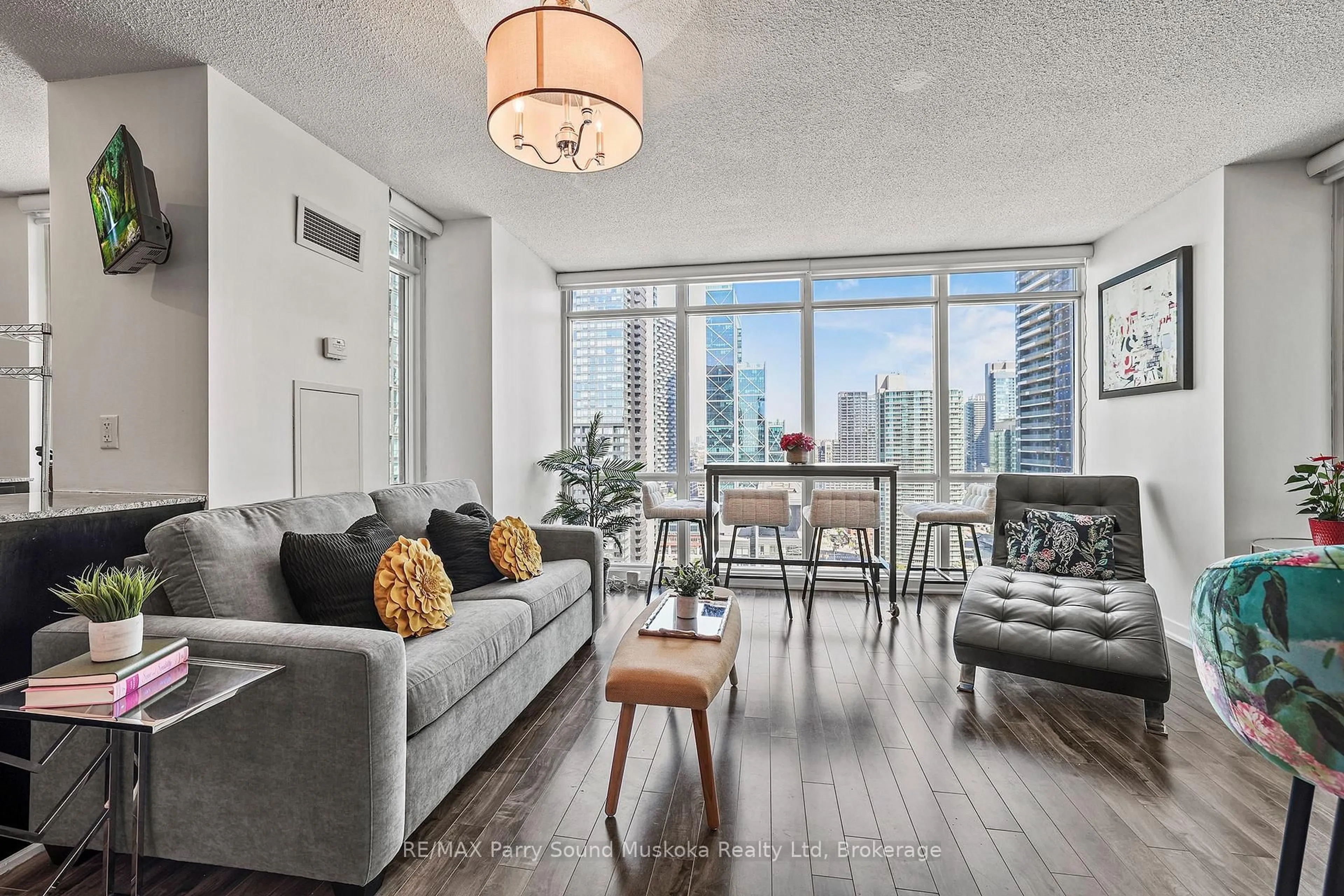 Living room with furniture, unknown for 11 Brunel Crt, Toronto Ontario M5V 3Y3