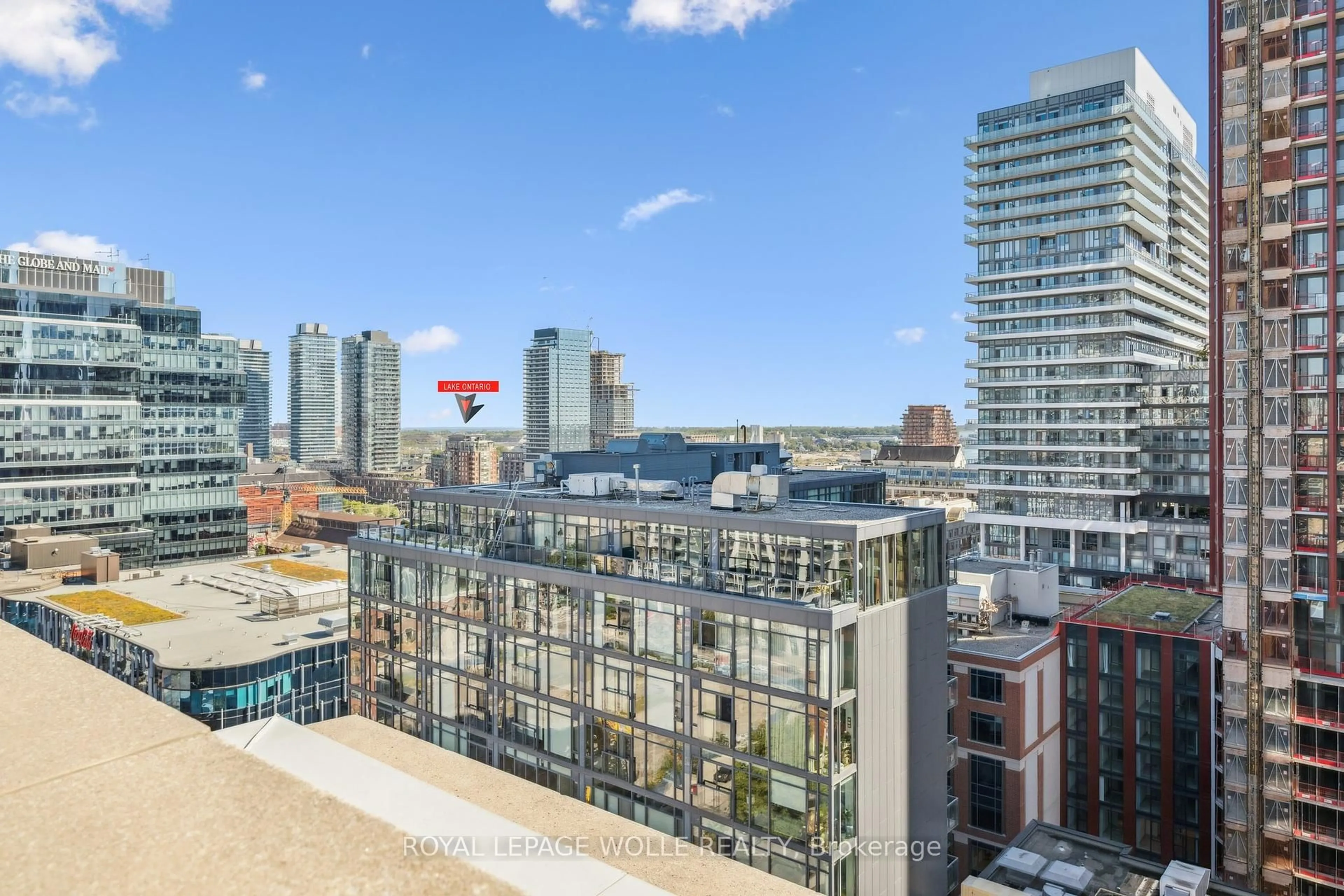 Patio, city buildings view from balcony for 230 King St #1109, Toronto Ontario M5A 1K5