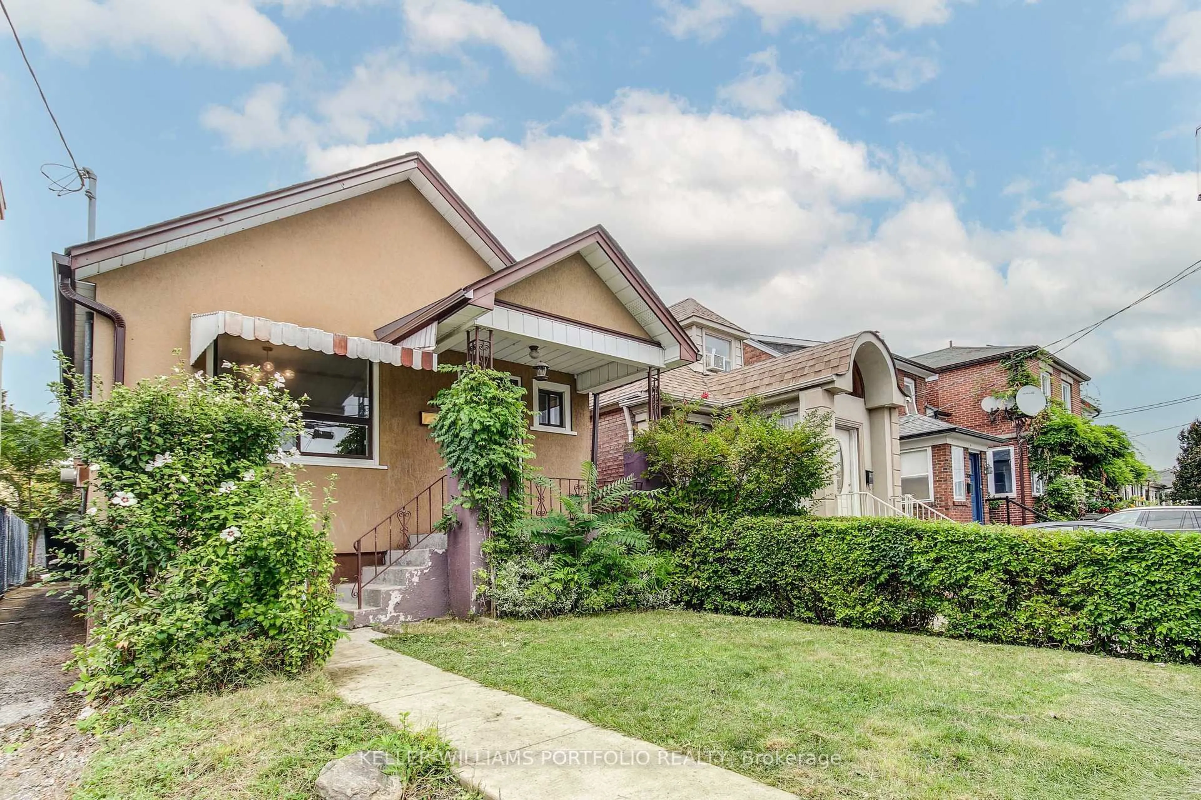 Home with brick exterior material, street for 108 Clovelly Ave, Toronto Ontario M6E 2E6
