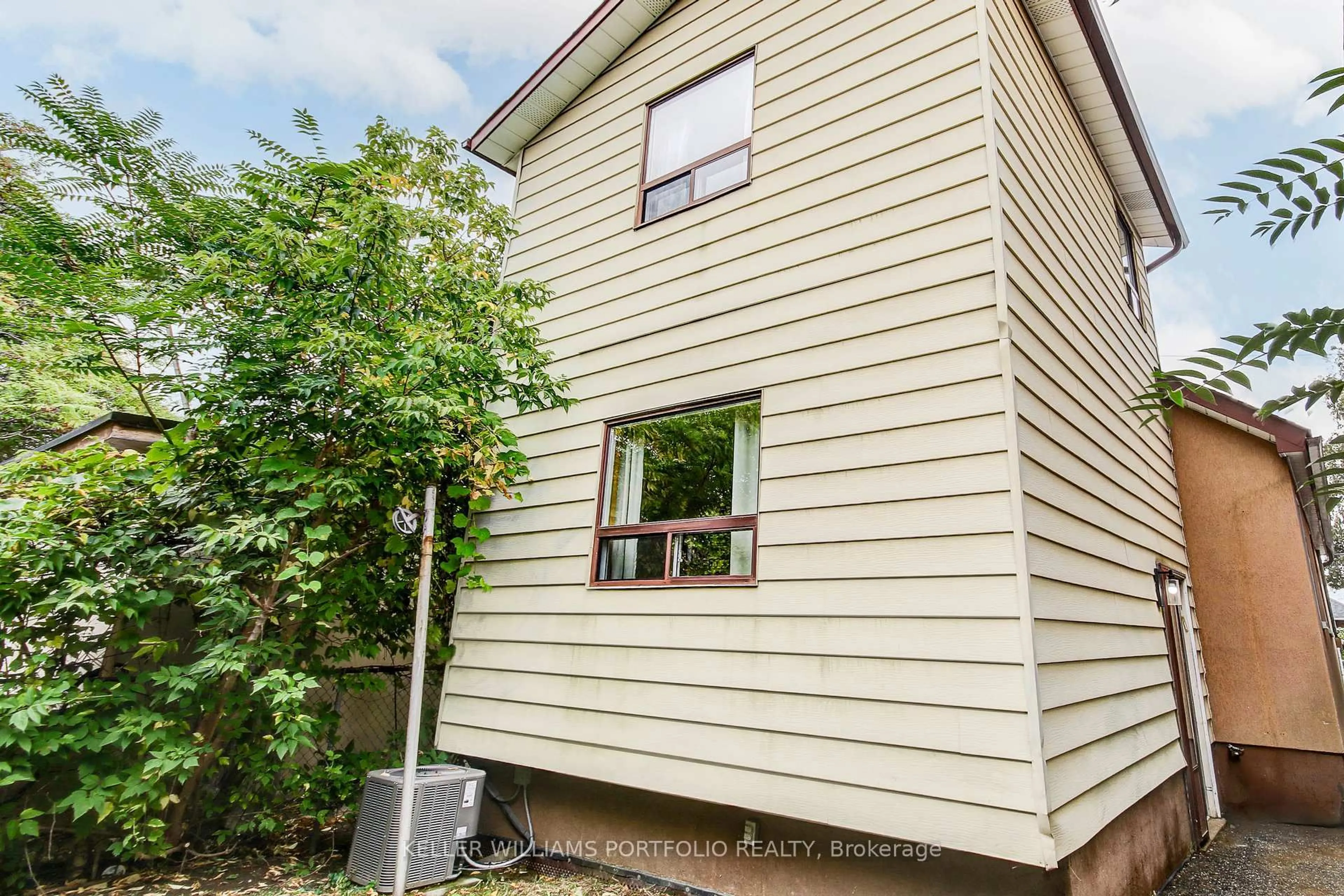 Home with vinyl exterior material, building for 108 Clovelly Ave, Toronto Ontario M6E 2E6