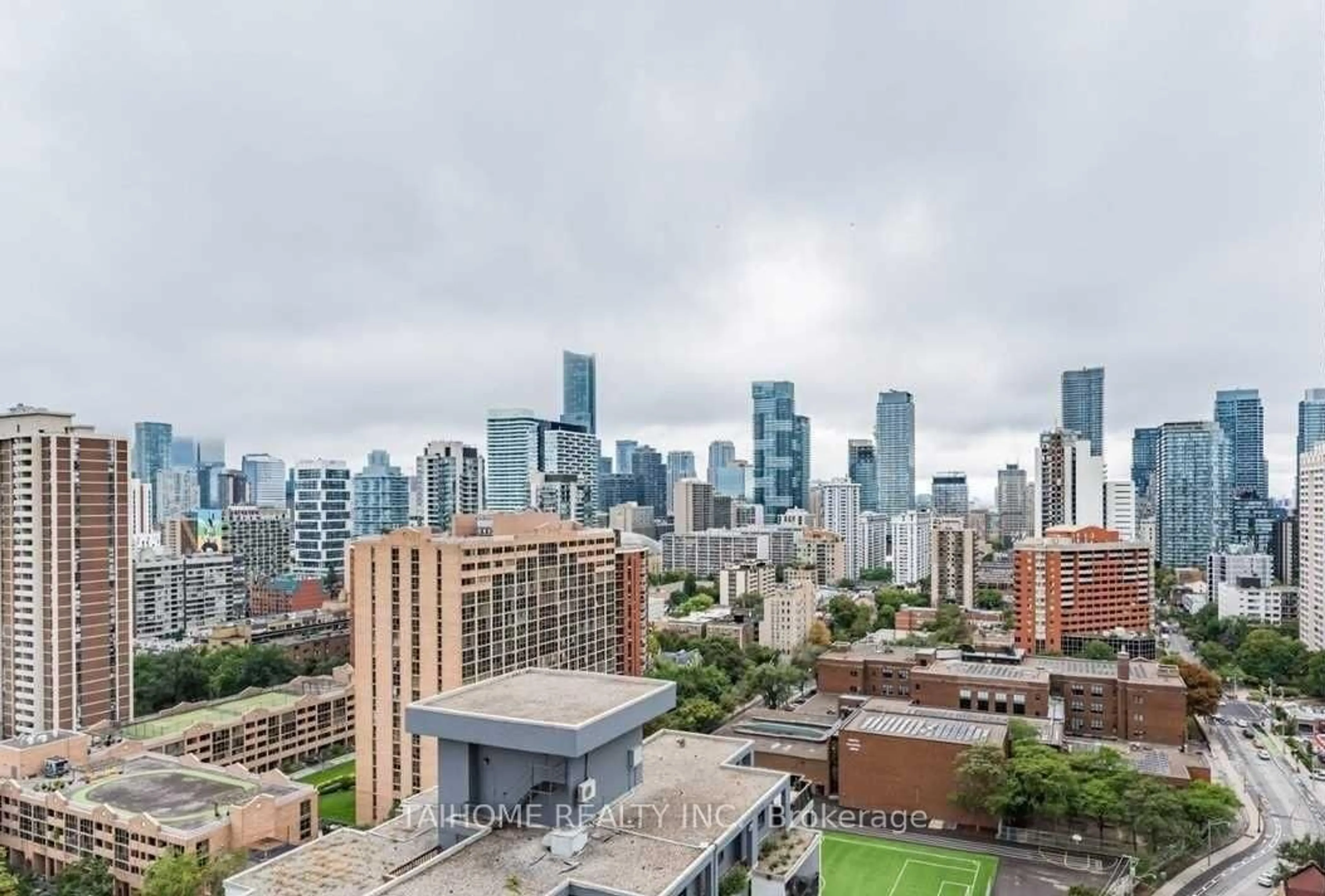 Patio, city buildings view from balcony for 159 Wellesley St #1509, Toronto Ontario M4Y 0H5