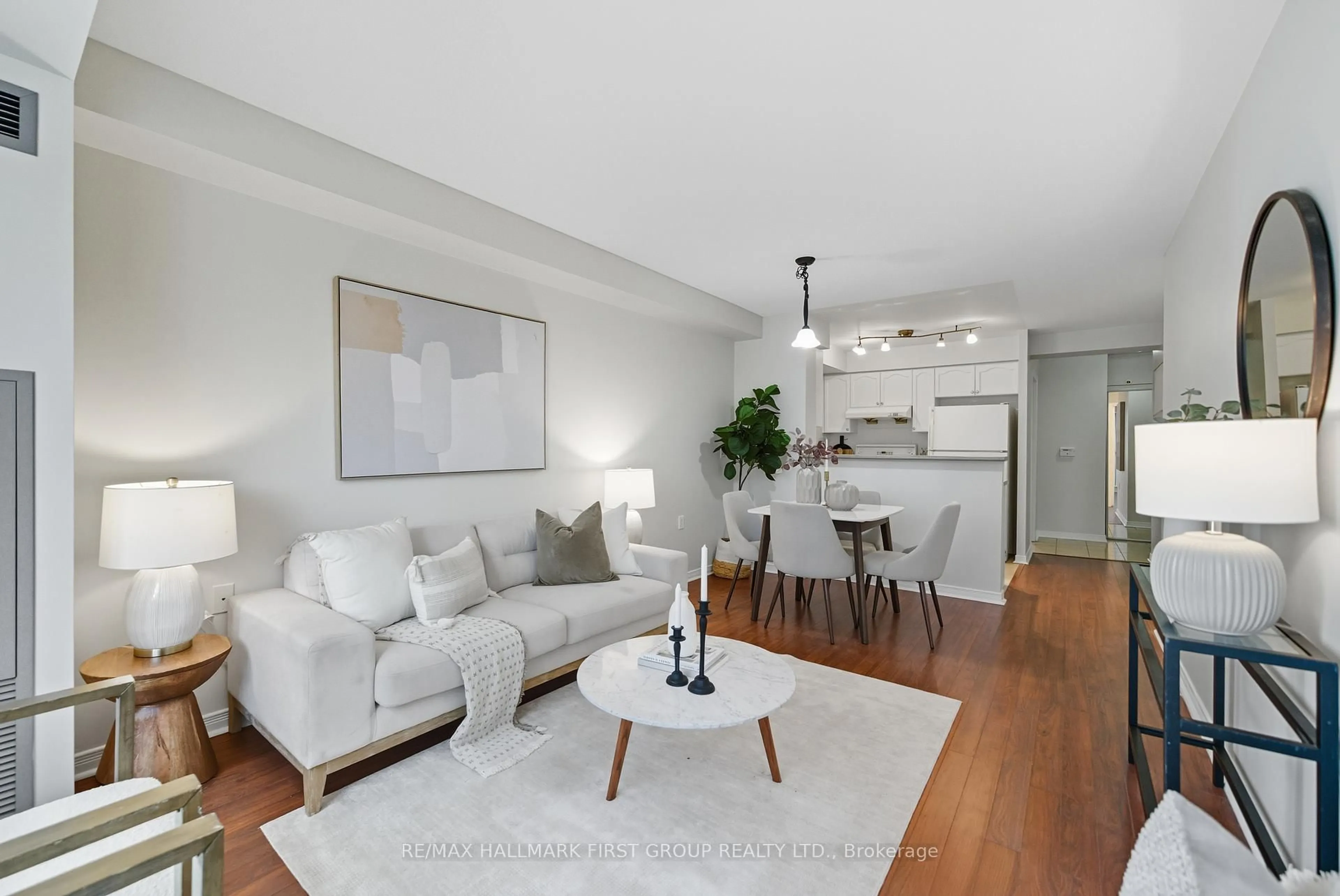 Living room with furniture, wood/laminate floor for 28 Olive Ave #612, Toronto Ontario M2N 7E6