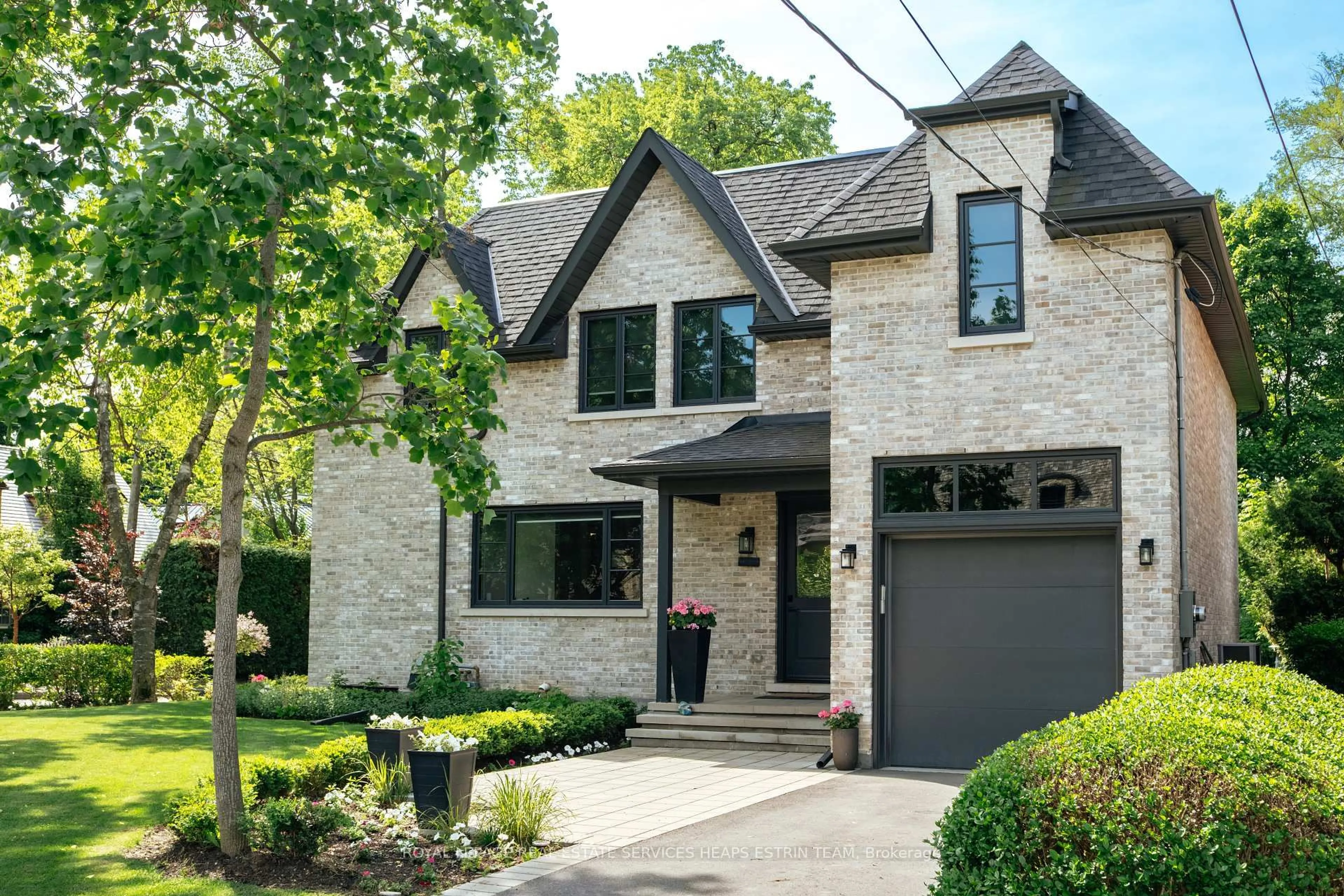 Home with brick exterior material, street for 44 Bennington Heights Dr, Toronto Ontario M4G 1A6